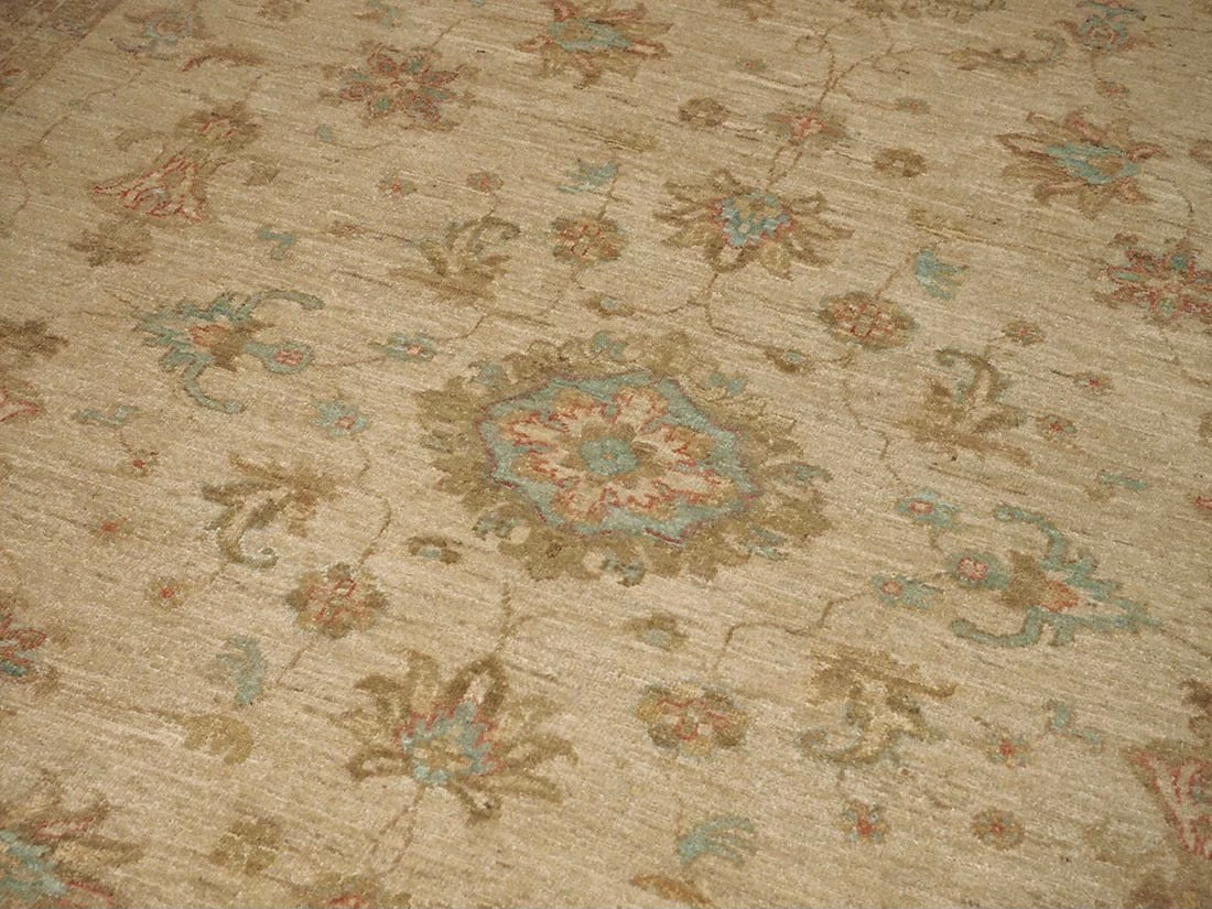 Authentic oriental rug with delicate floral pattern in beige