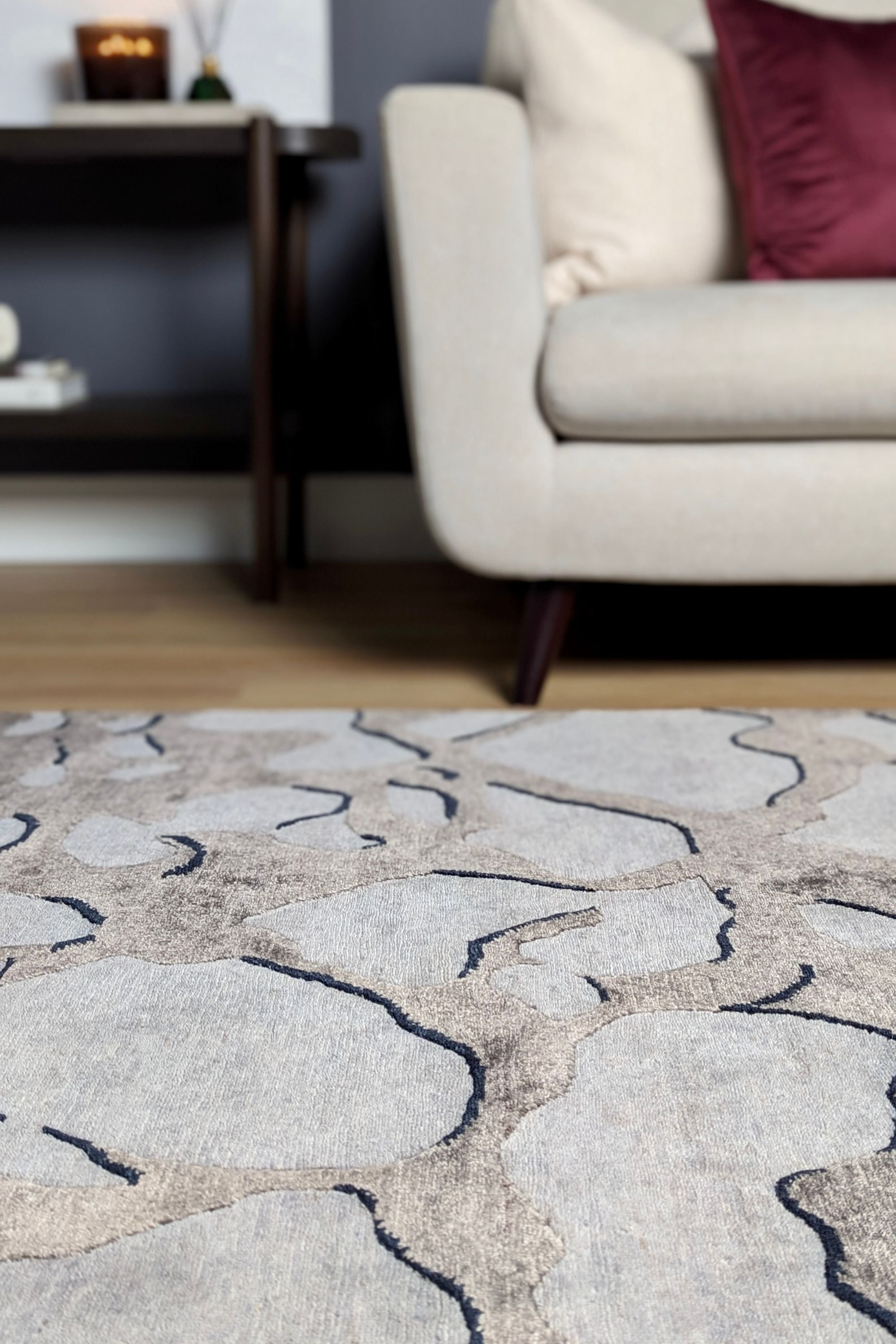 Luxury grey and silver rug with abstract pattern