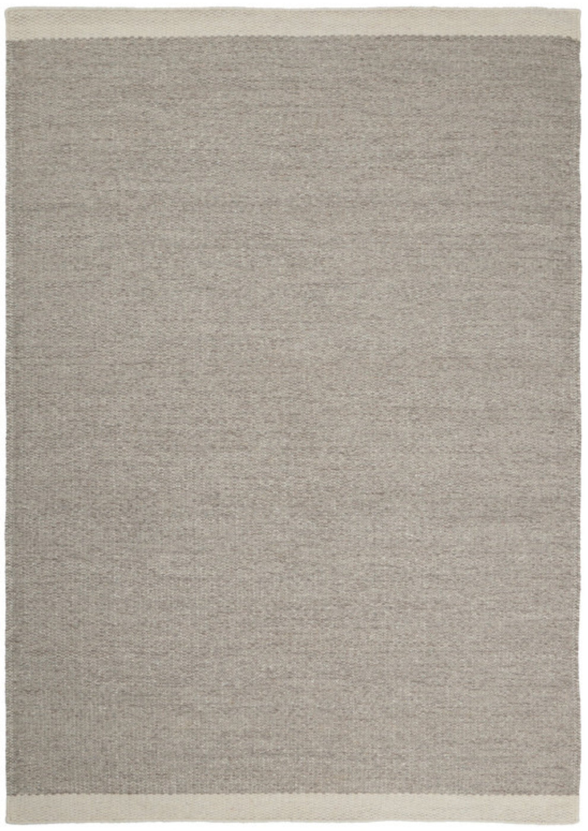 Woven beige wool rug