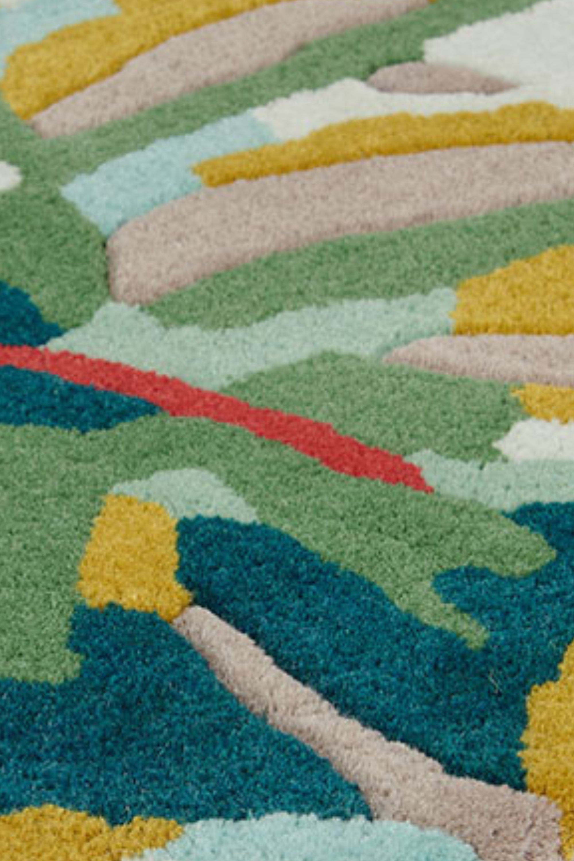 Harlequin rug with a multicolour leaf pattern