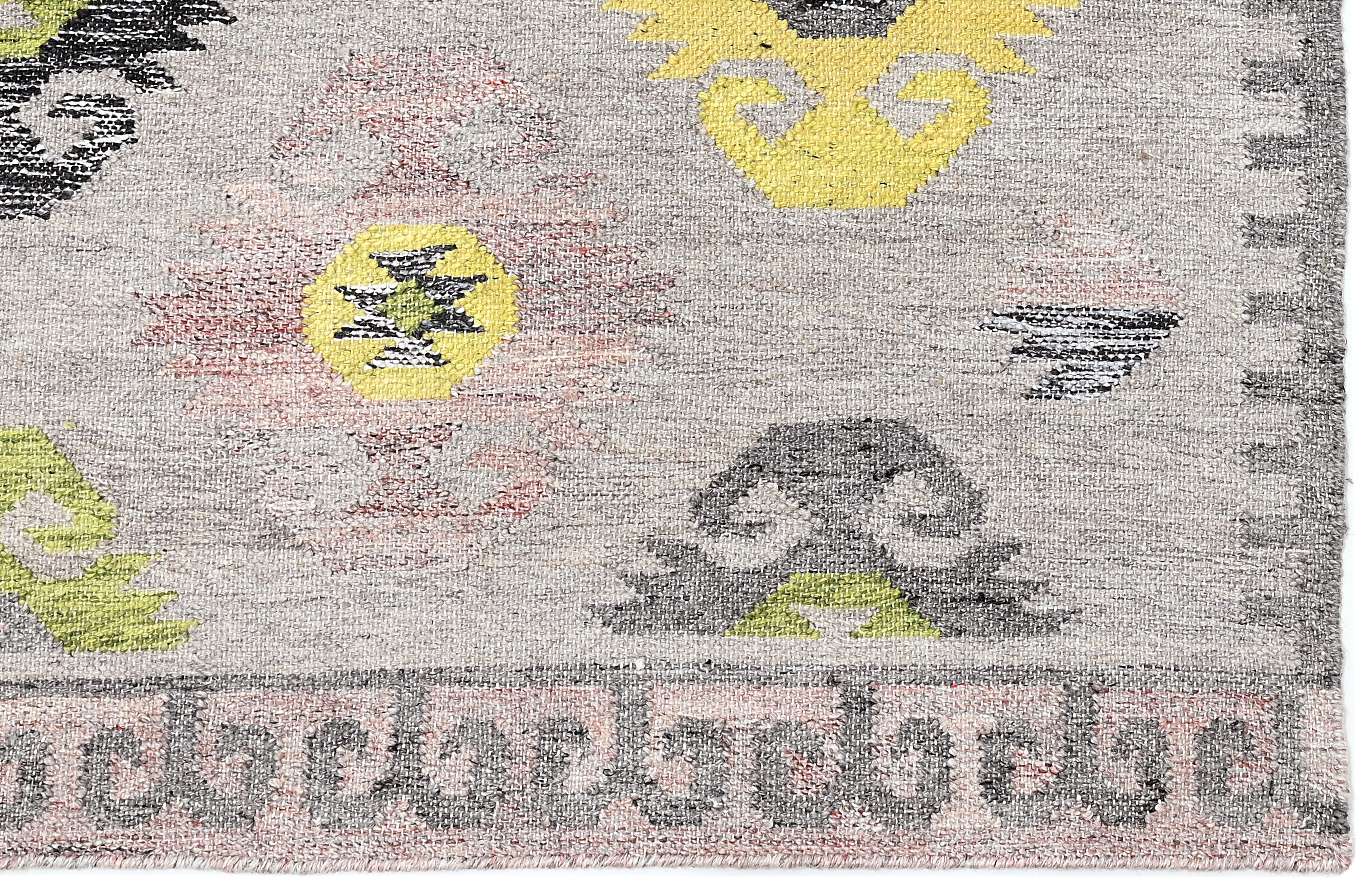 Flatweave rug with green, grey and pink Moroccan design 