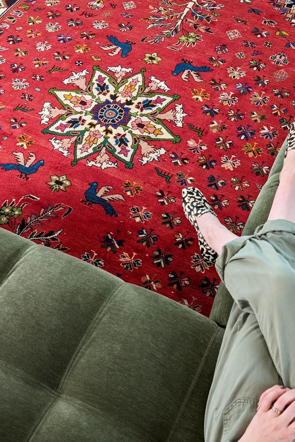 red and black persian rug with geometric design