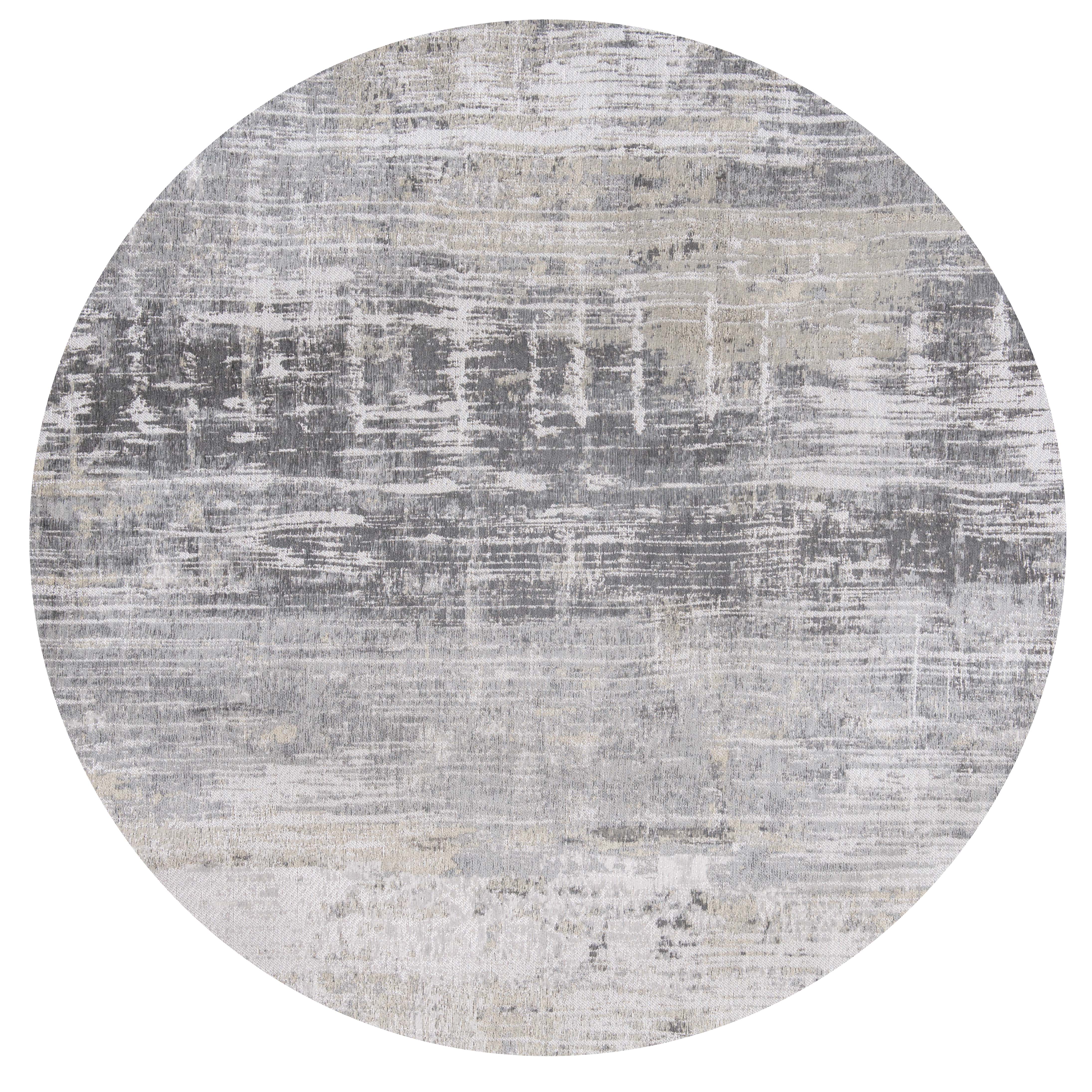 Flatweave circle rug with abstract stripe pattern in grey