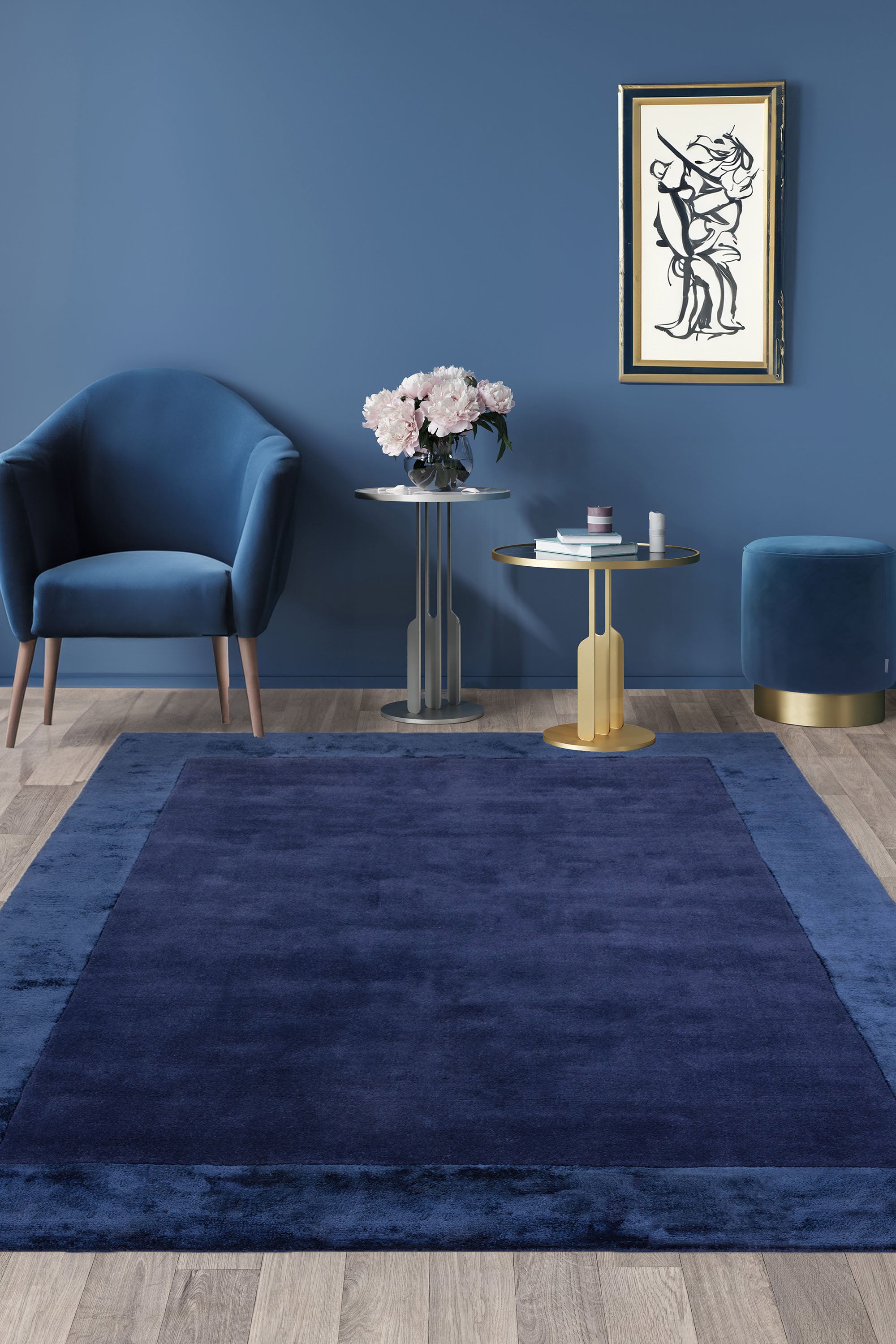 Navy wool and viscose rug with a border design