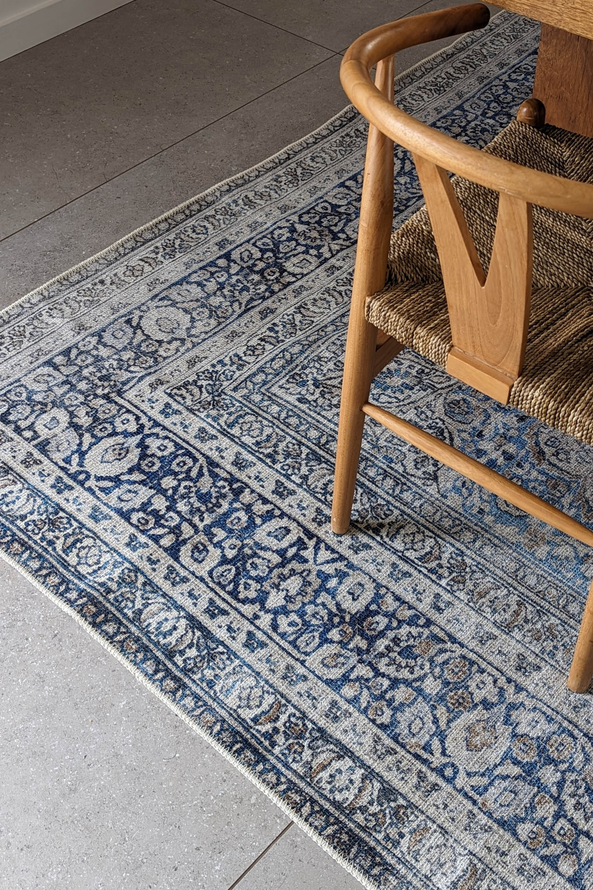 Blue and grey bordered vintage style rug