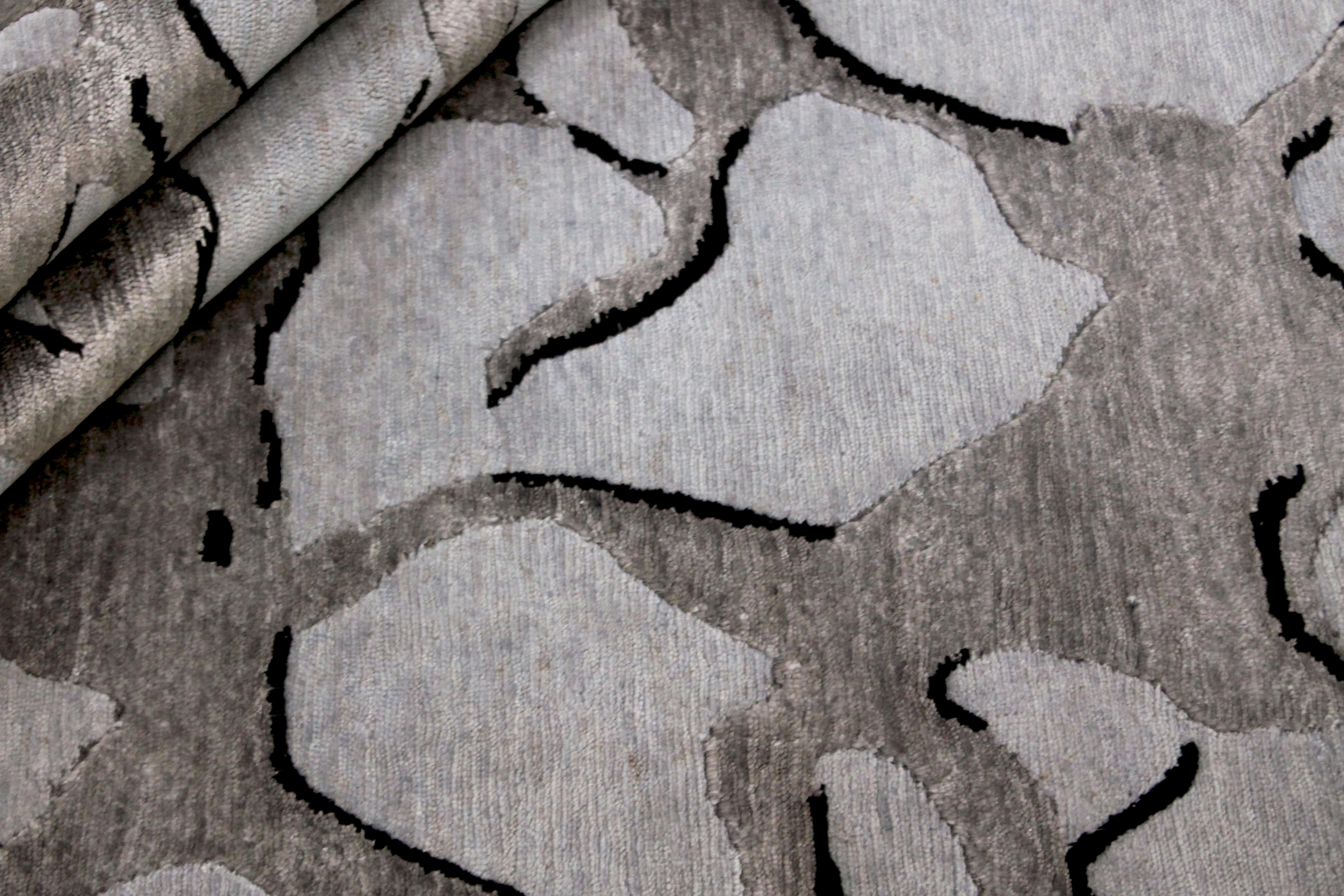 Large beige and grey abstract rug