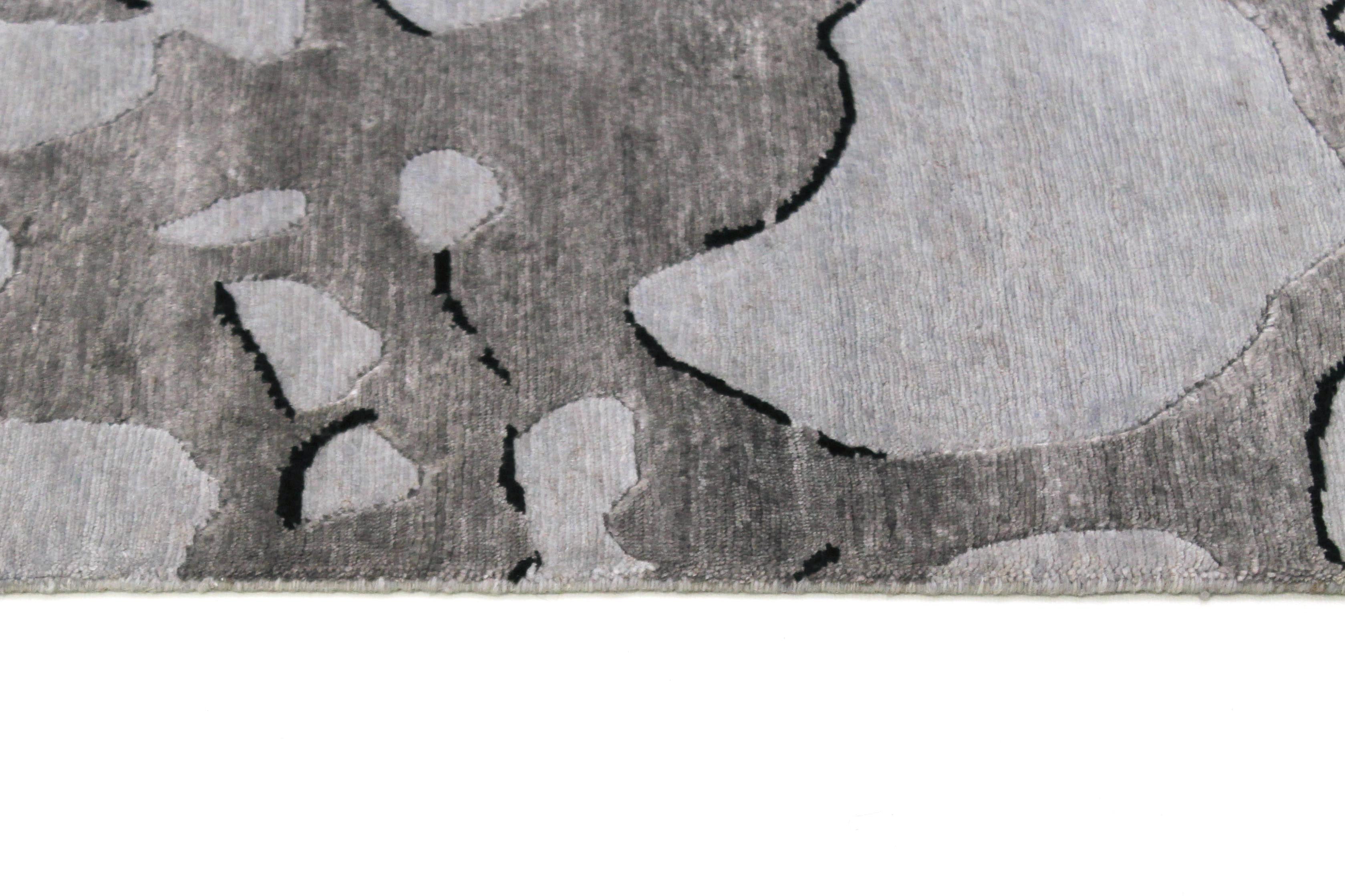 Large beige and grey abstract rug