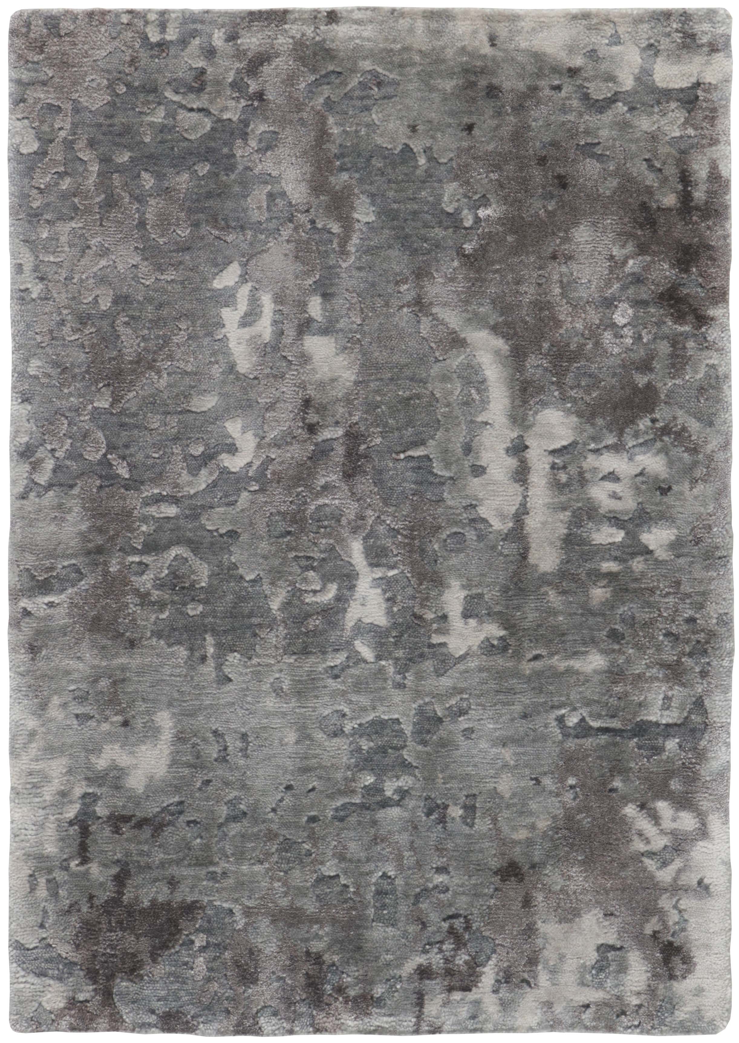 Area rug with abstract design in grey and beige