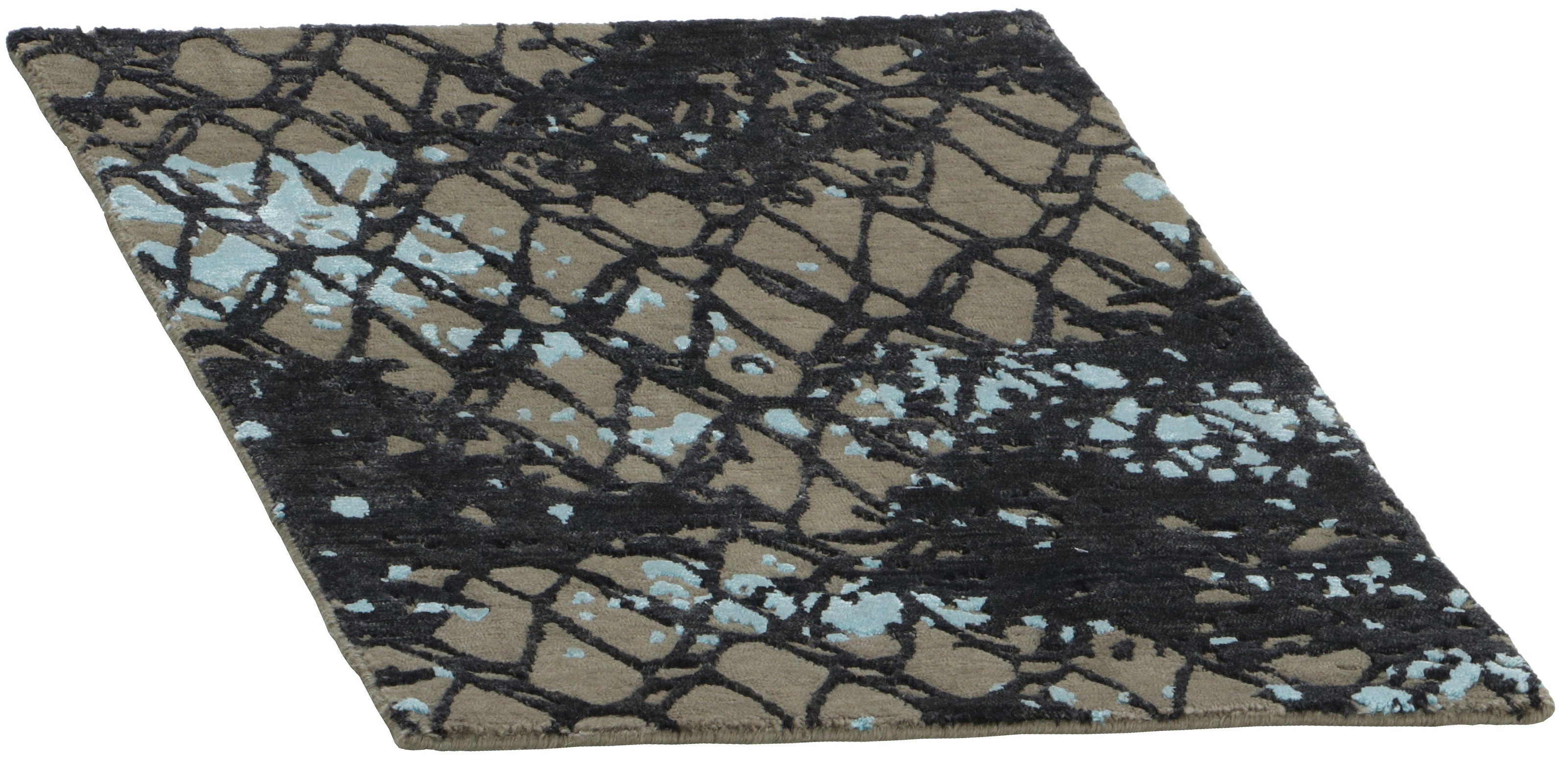 Area rug with abstract design in blue