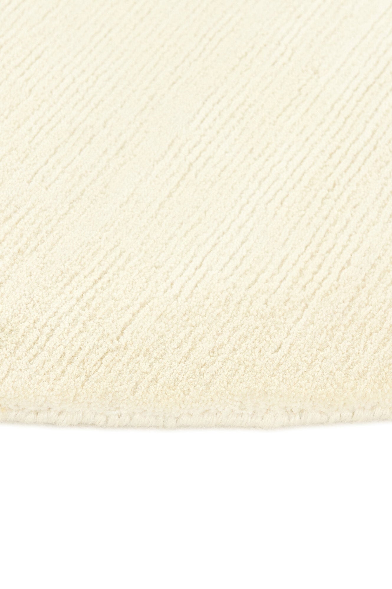 Luxury plain modern round cream rug