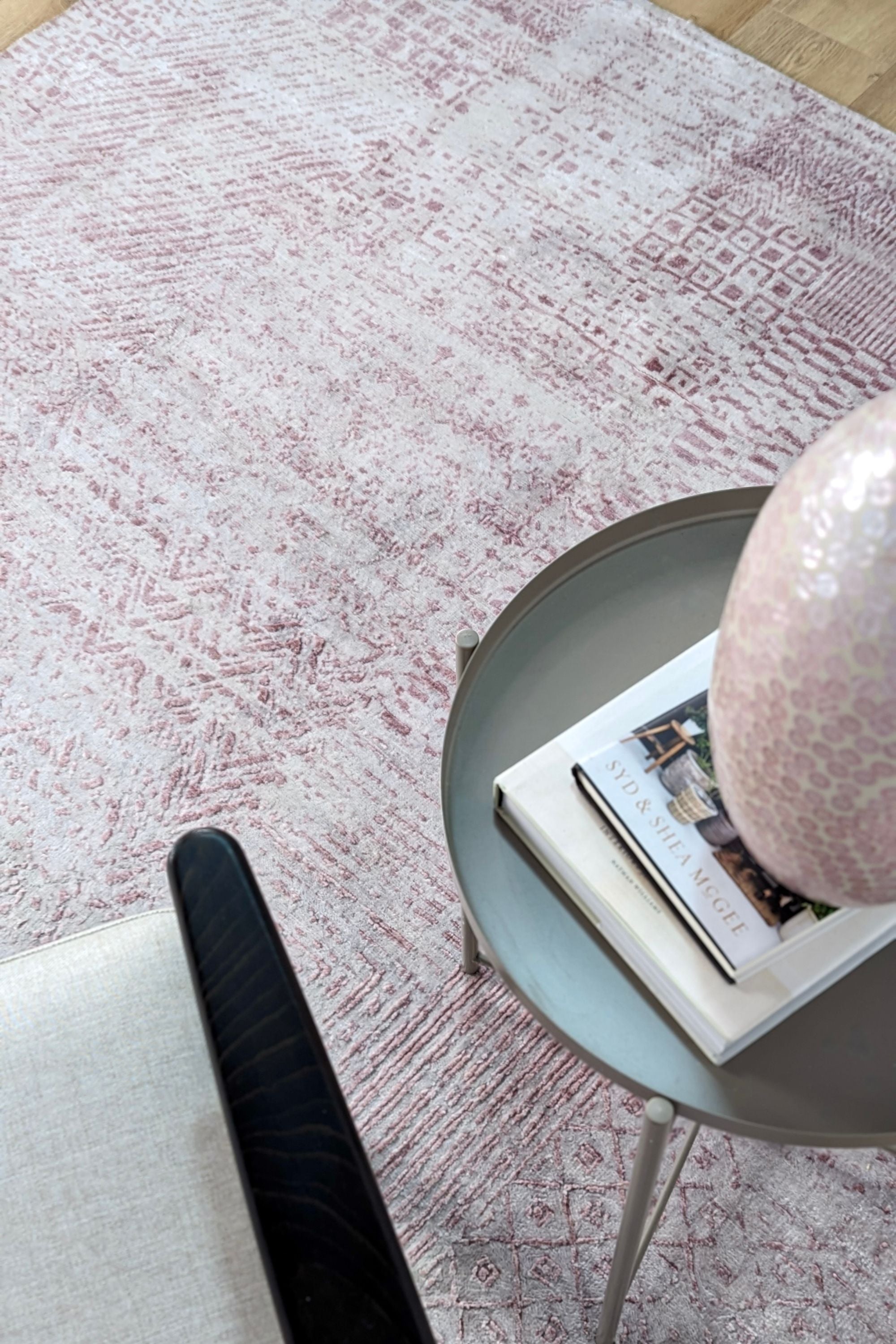 Pink and beige abstract area rug