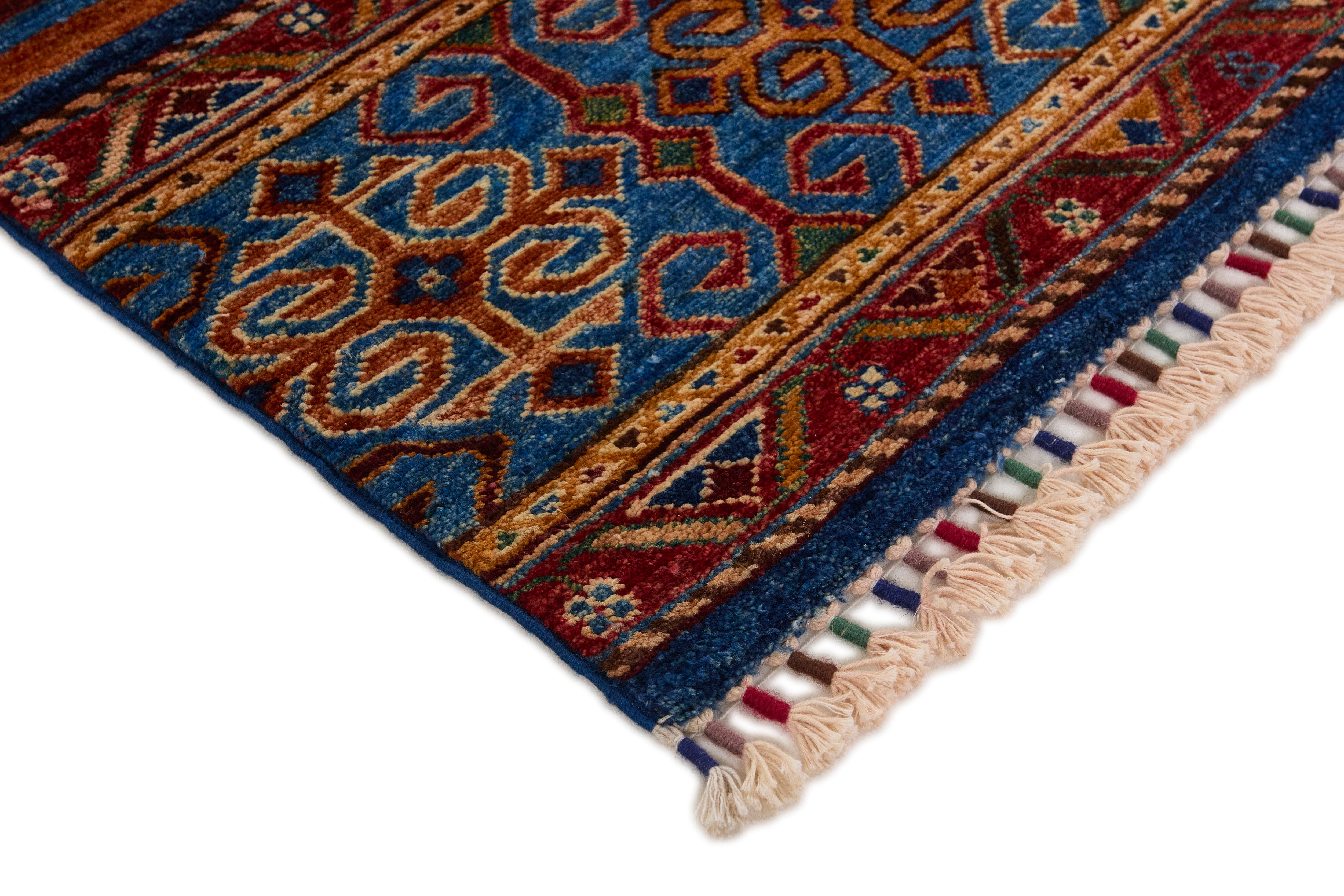 Authentic oriental Shall collection rug with traditional tile pattern in multicolour.