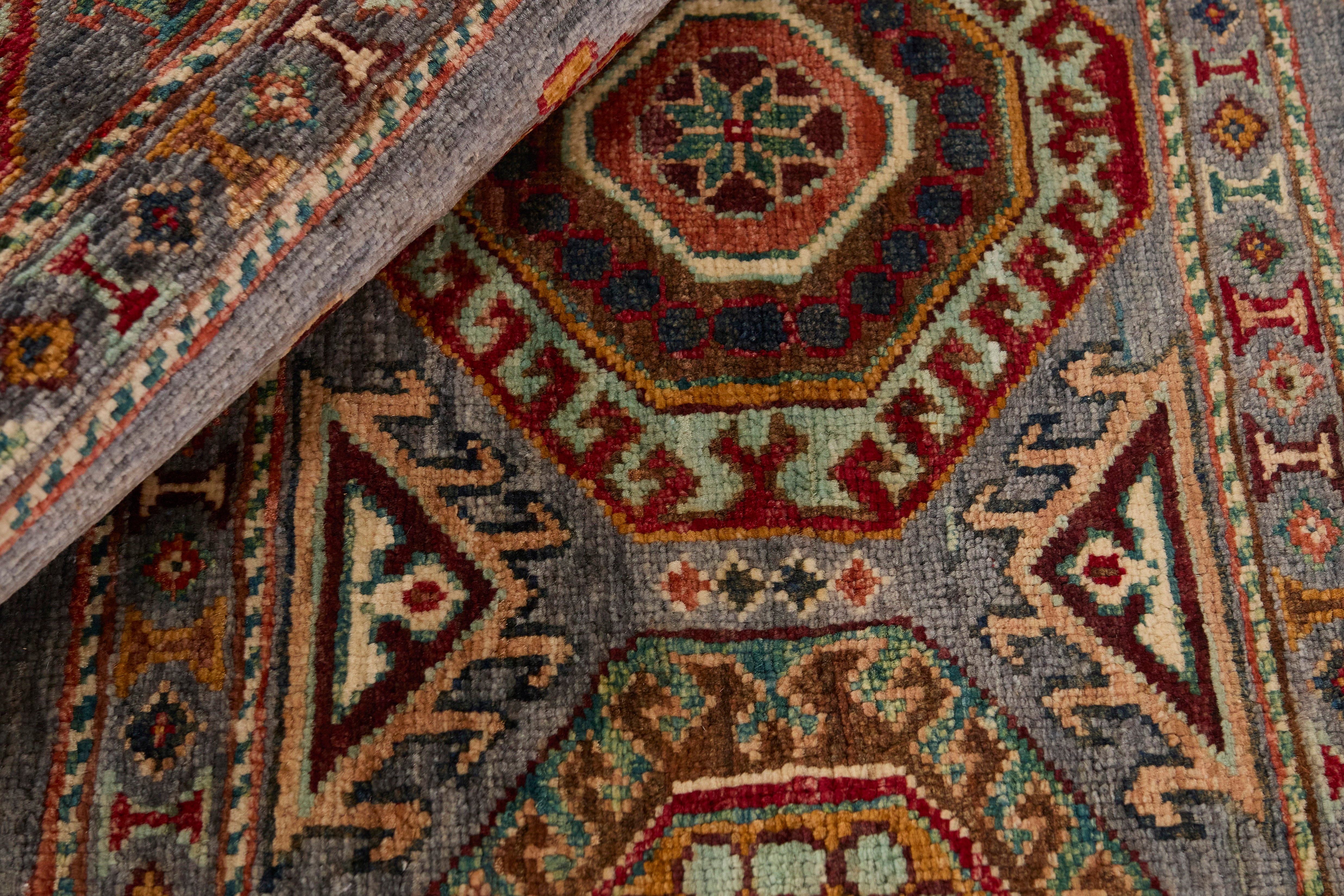 Authentic oriental Shall collection rug with traditional tile pattern in multicolour.