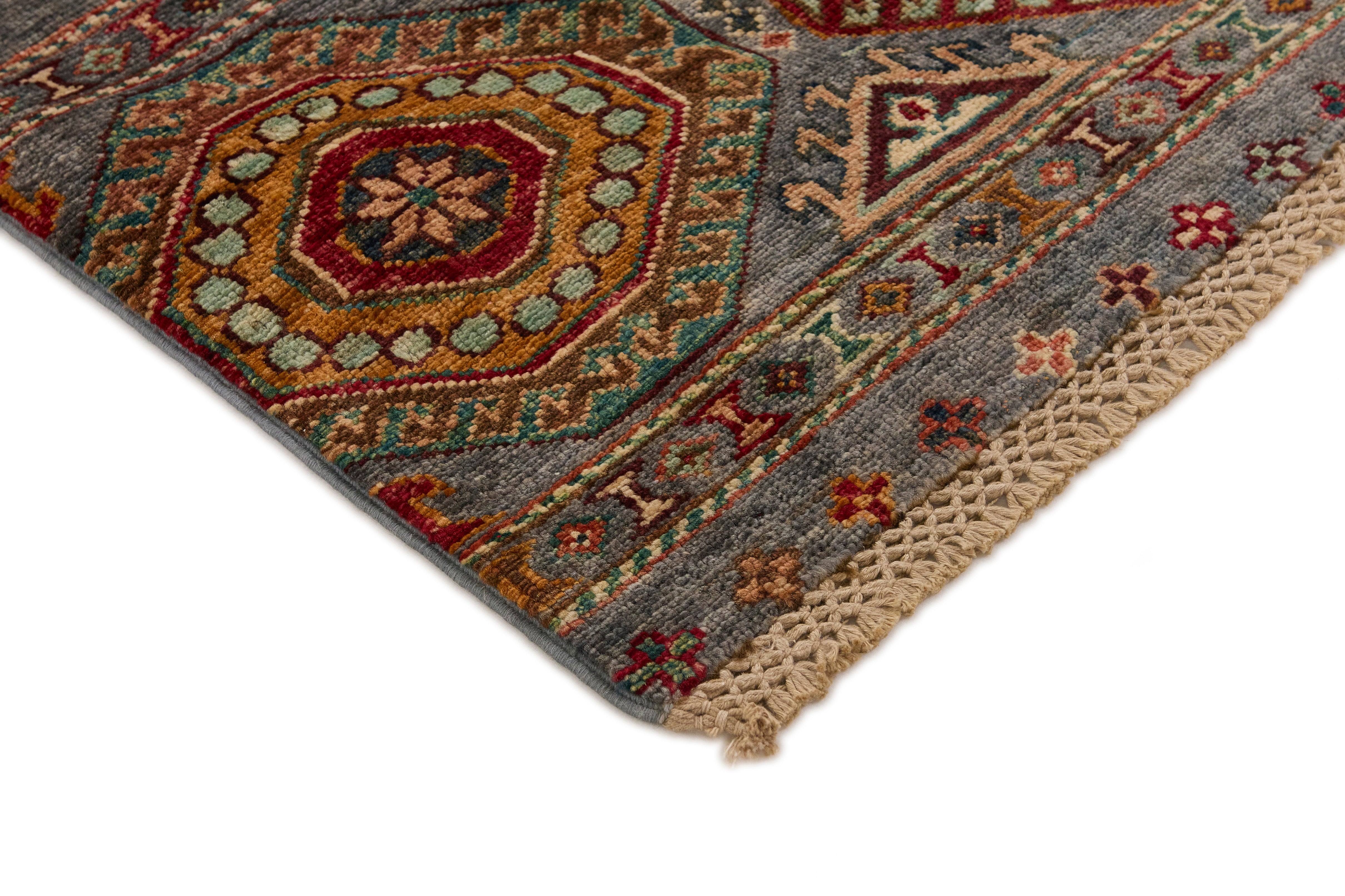 Authentic oriental Shall collection rug with traditional tile pattern in multicolour.