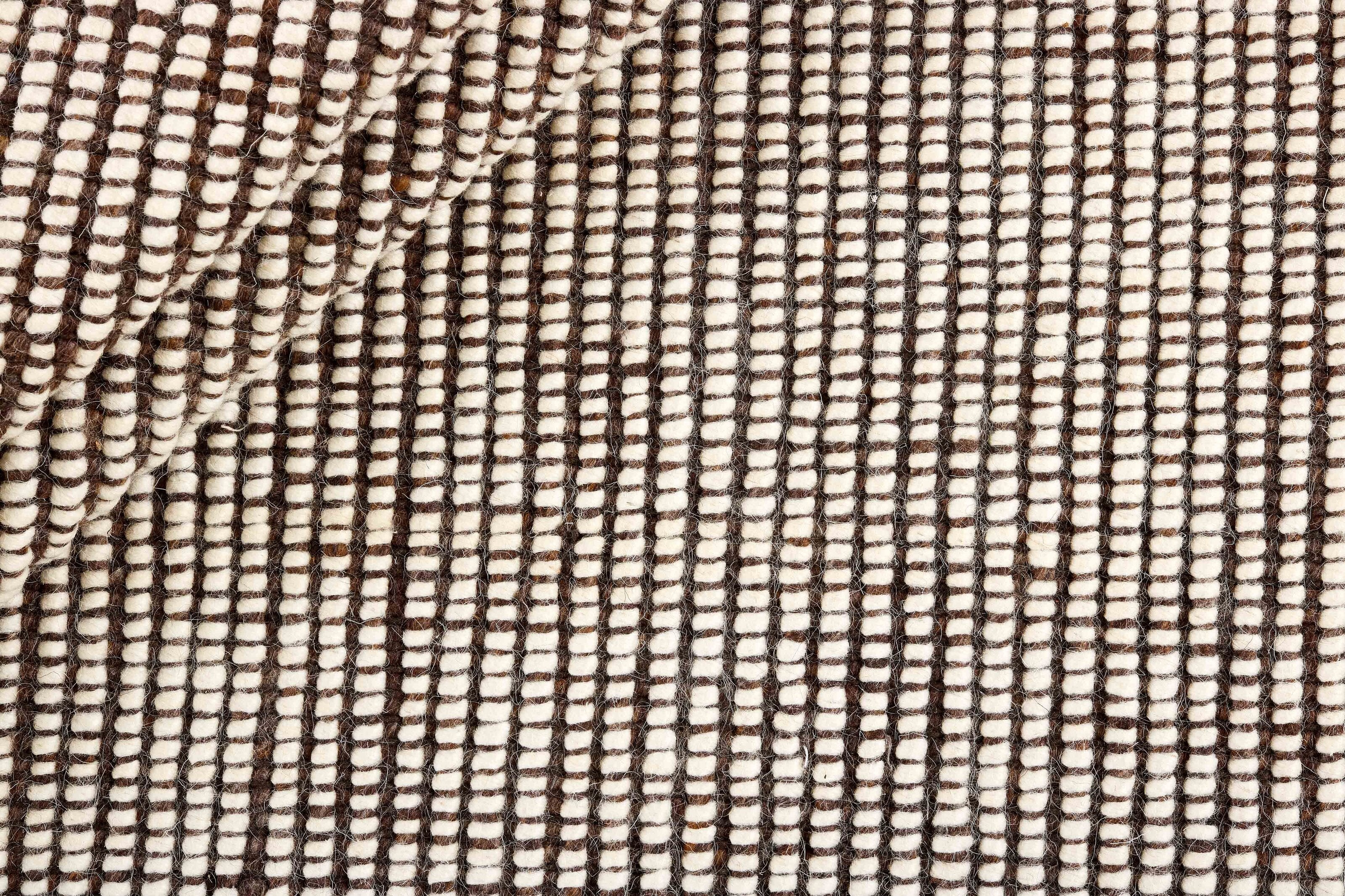 Brown textured flatweave rug