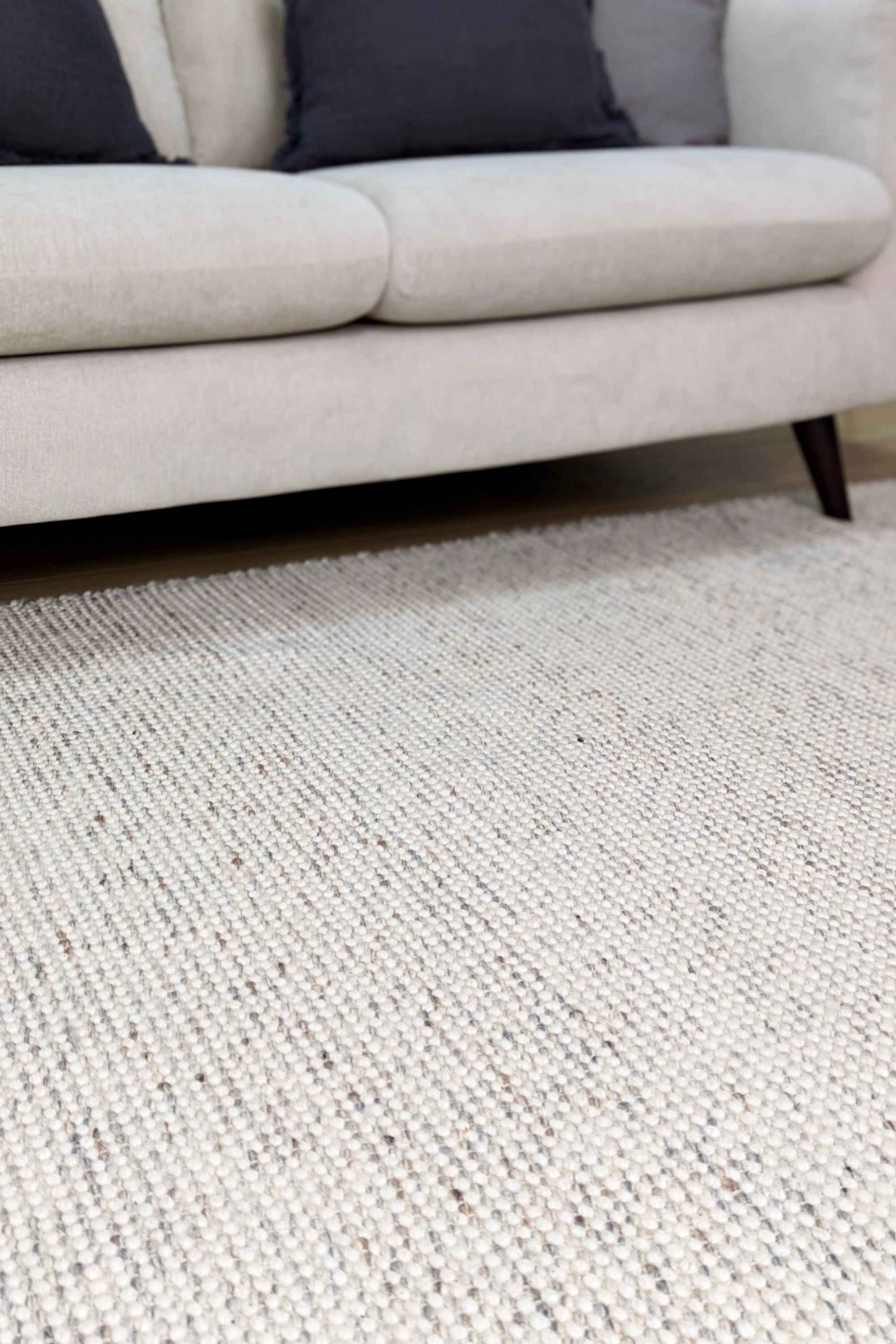 Grey textured area rug