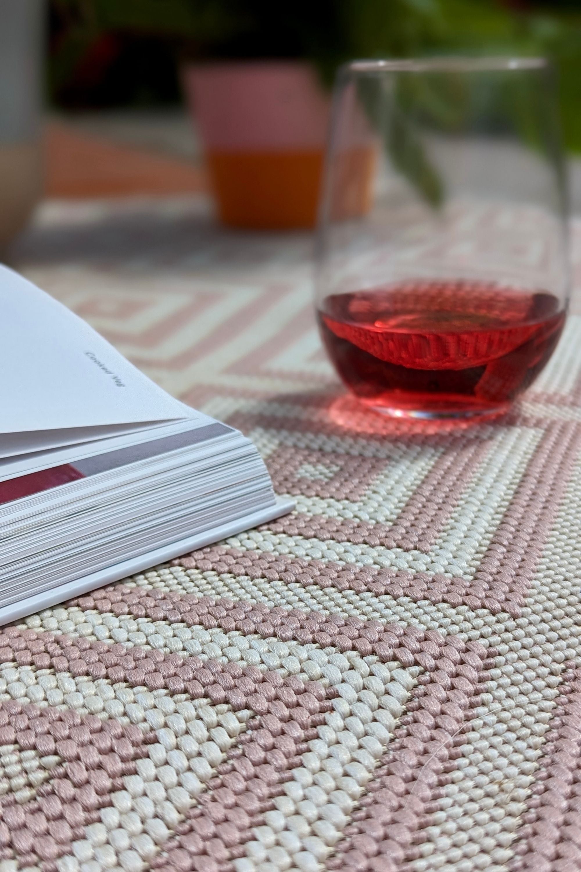 pink and white geometric rug for indoors and outdoors