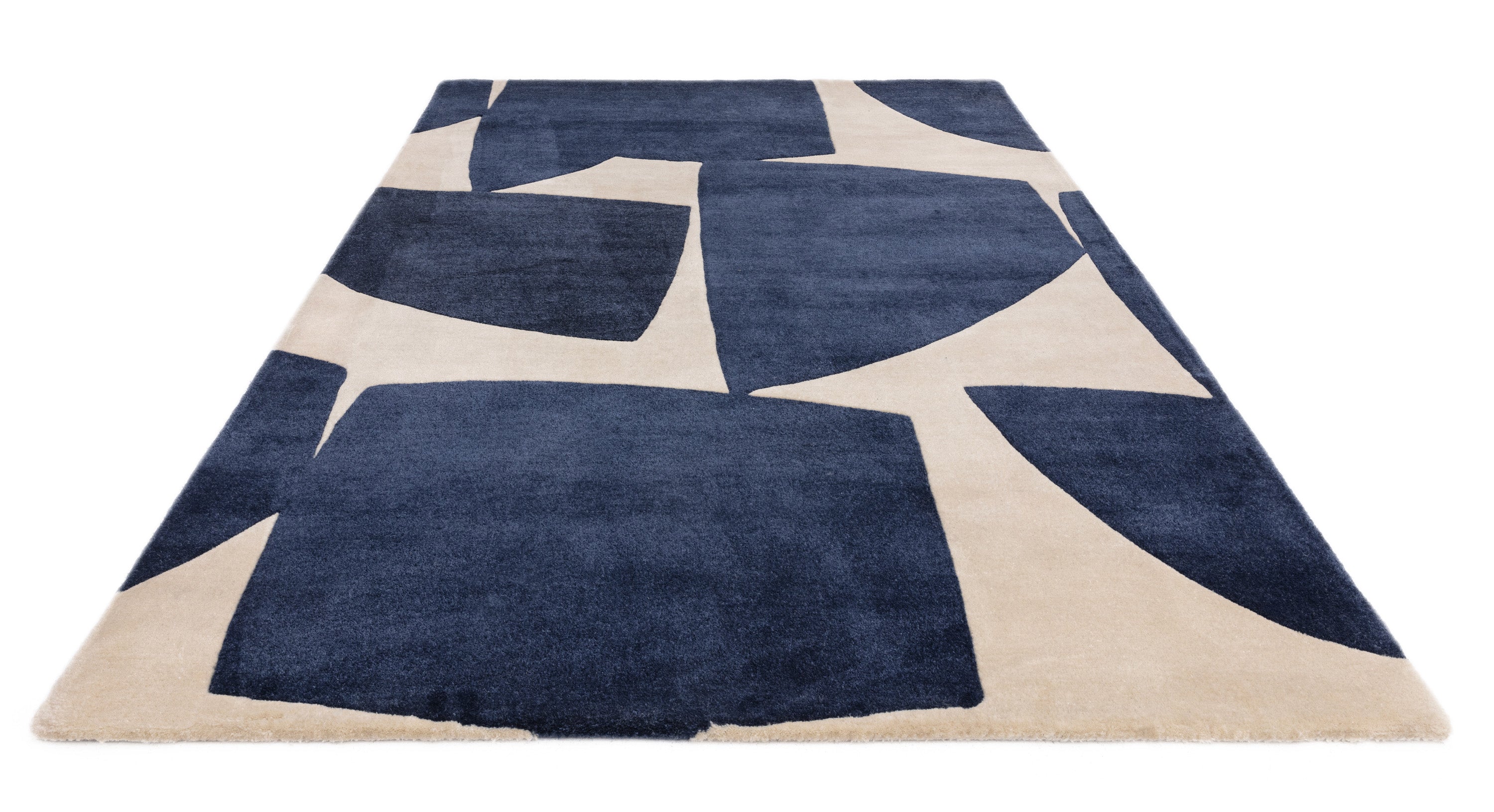 Blue and cream rug with abstract pattern