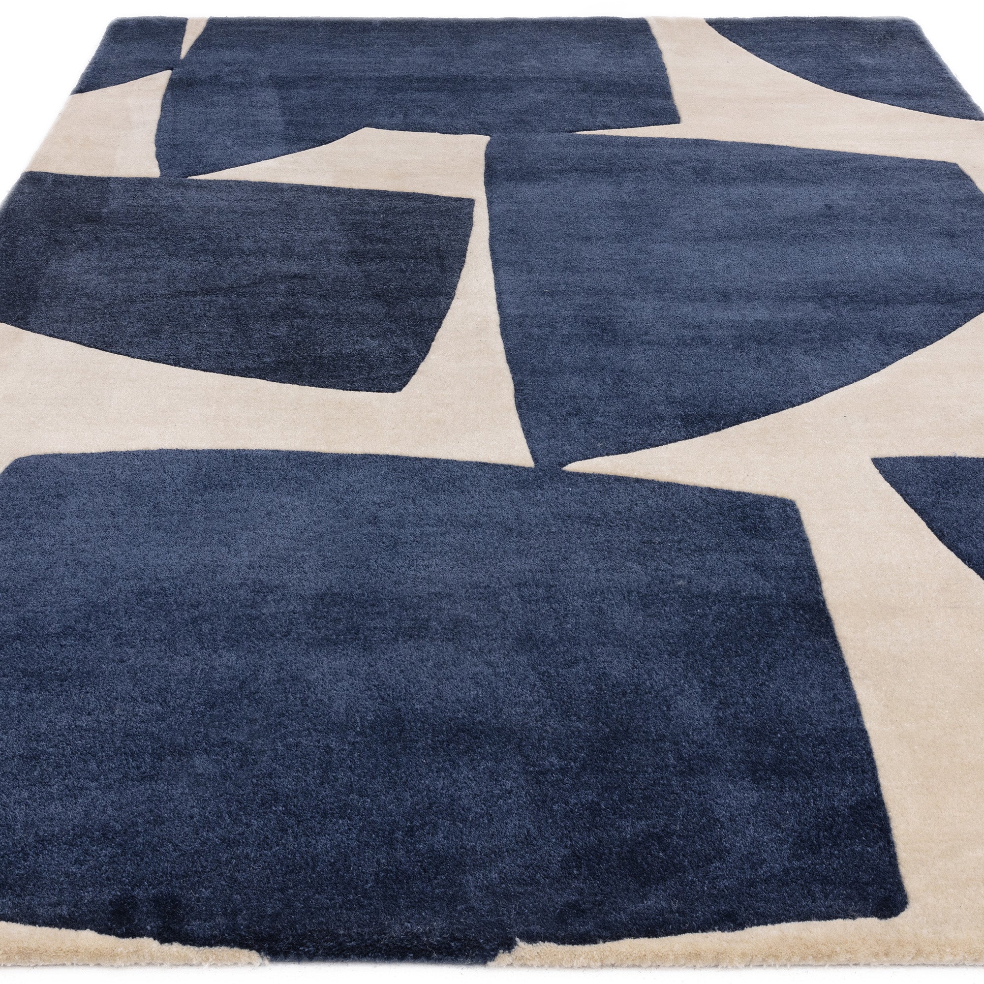 Blue and cream rug with abstract pattern