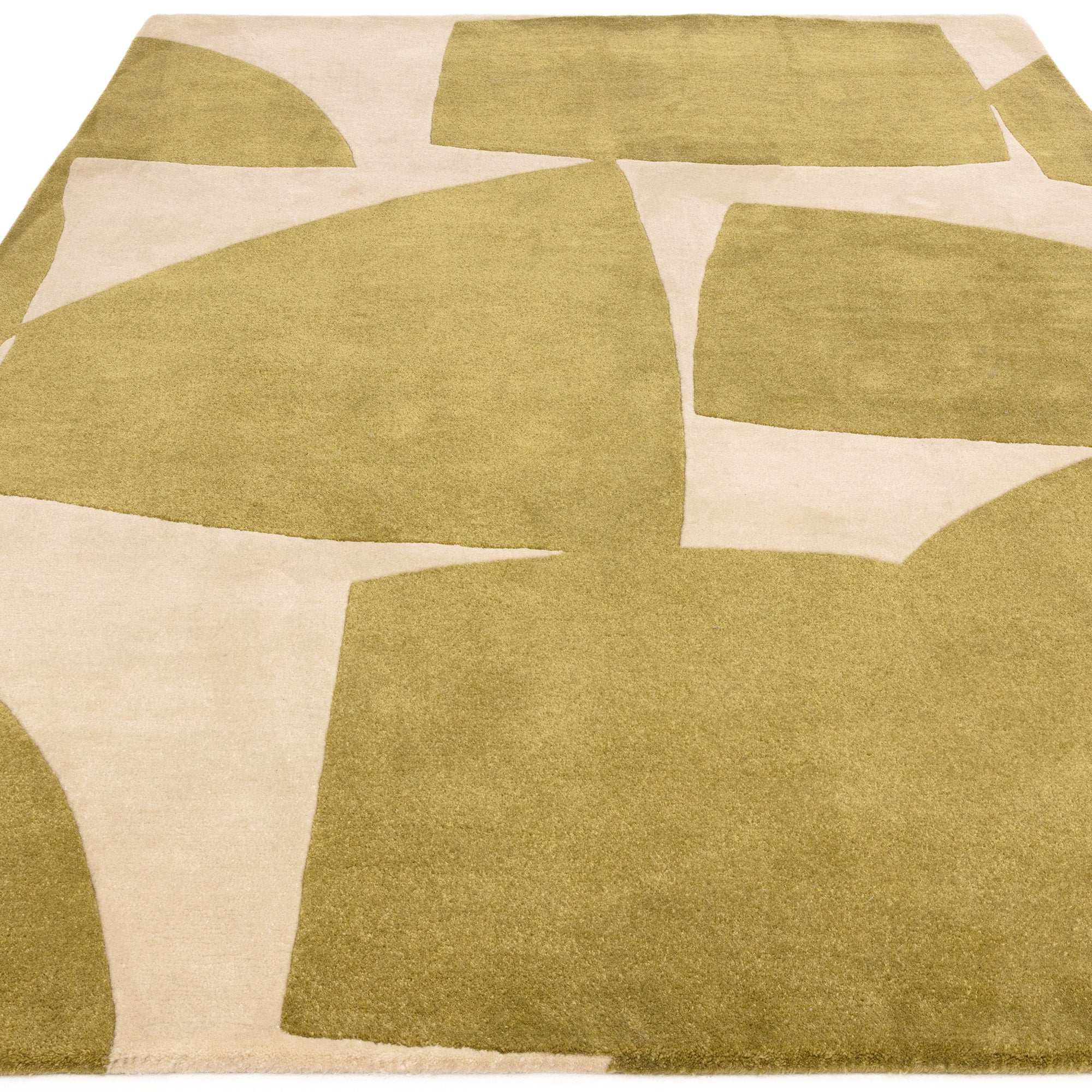 Sage green and cream rug with abstract pattern