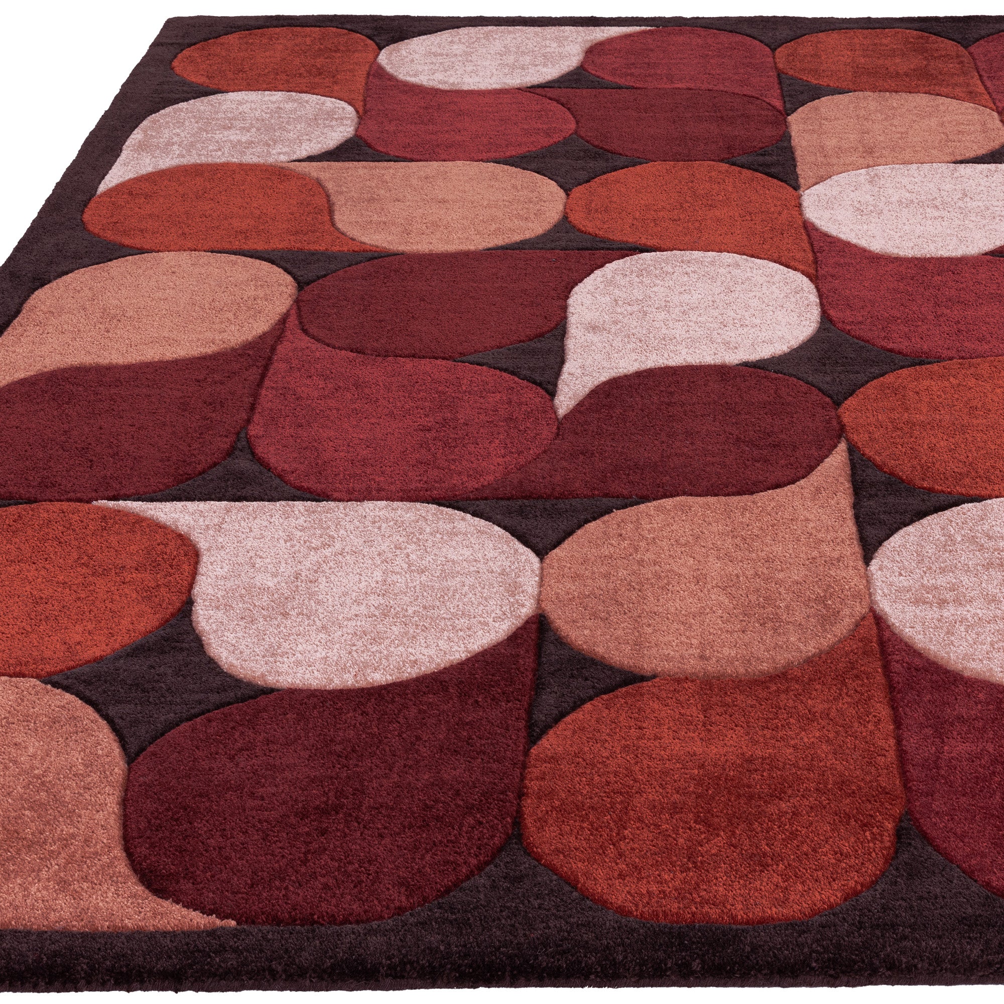 Red rug with an abstract pattern