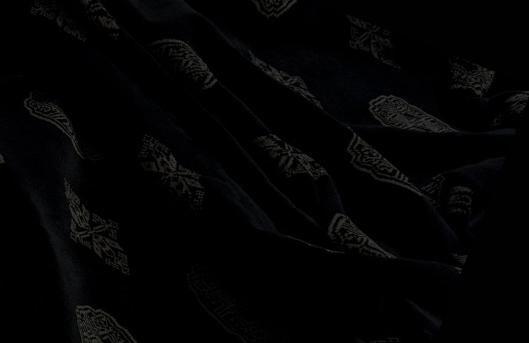 Black Bokhara Rug with Sale Messaging