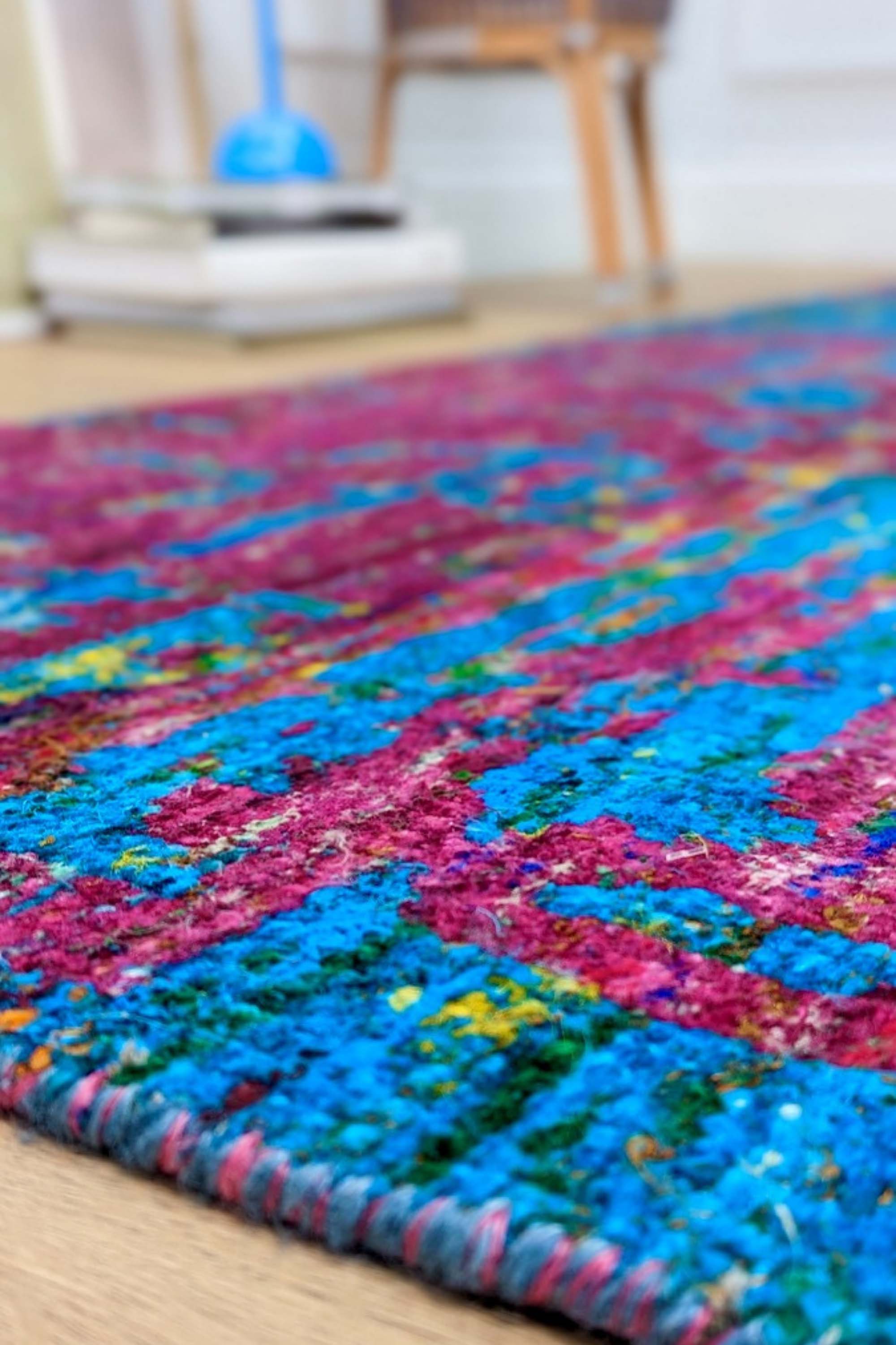 blue and pink rug woven from recycled sari silks