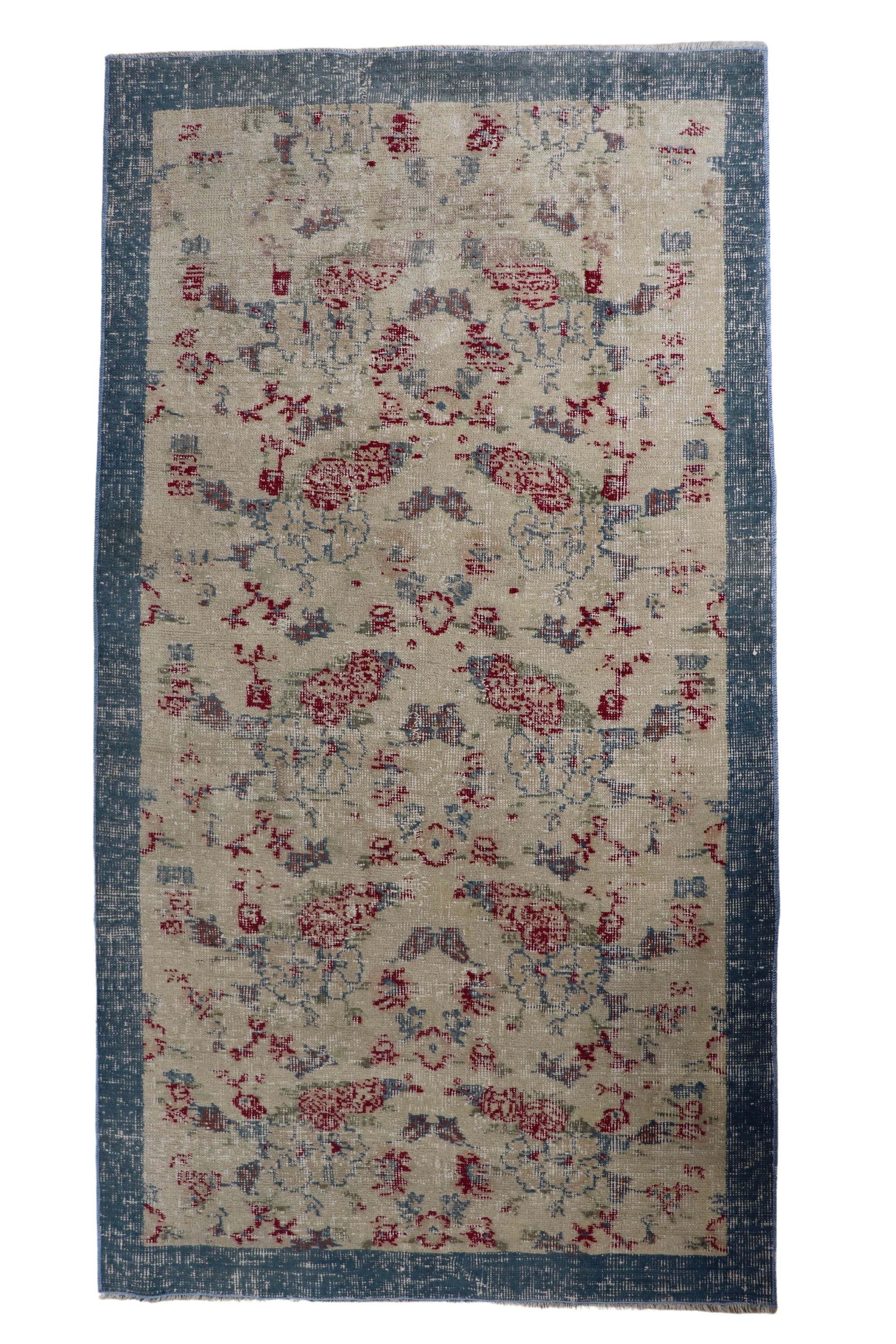 Vintage rug with blue border
