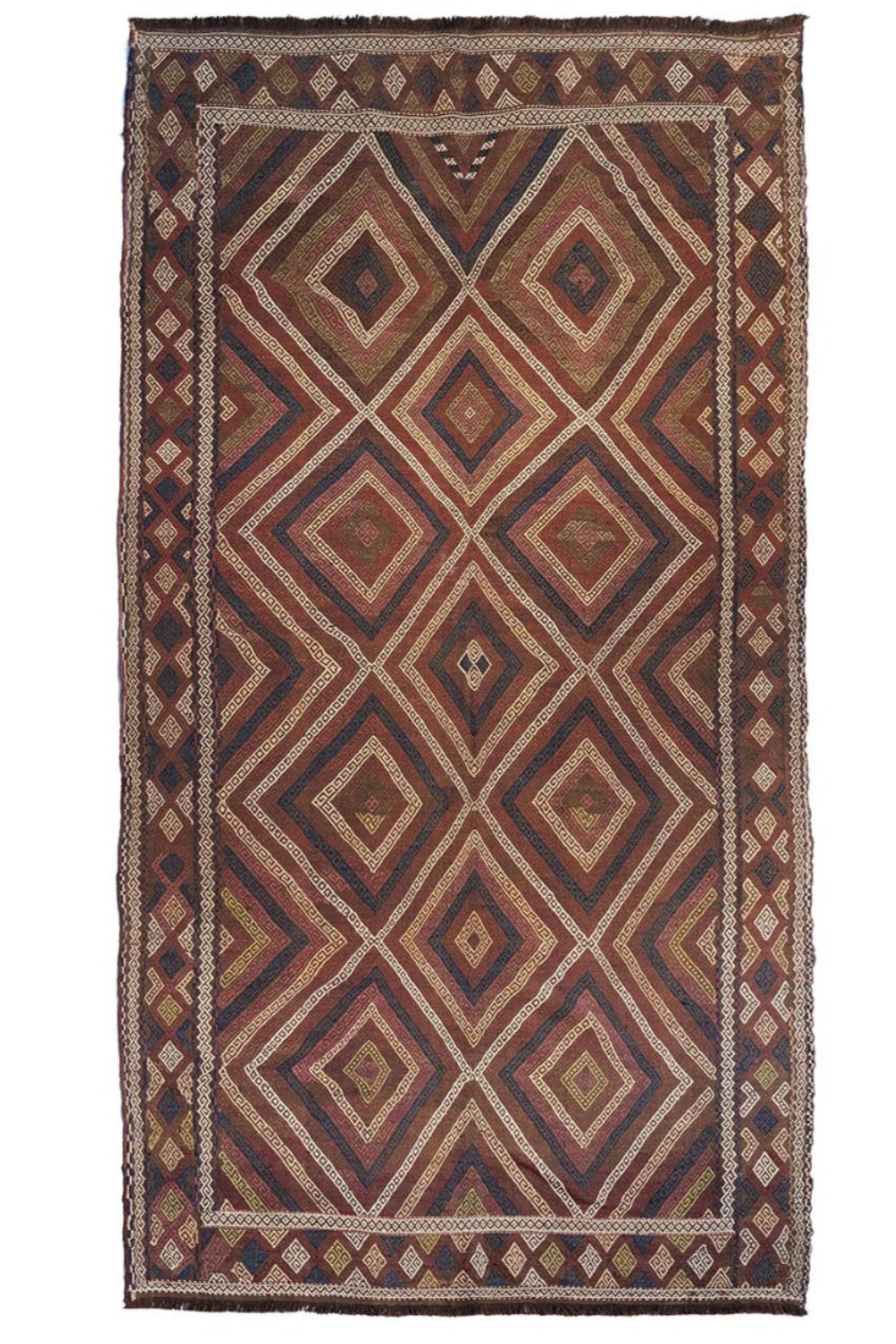 Brown, black, and red traditional Afghan rug