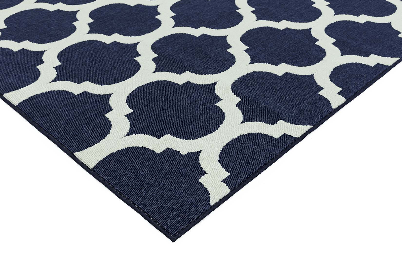navy indoor/outdoor rug with trellis design
