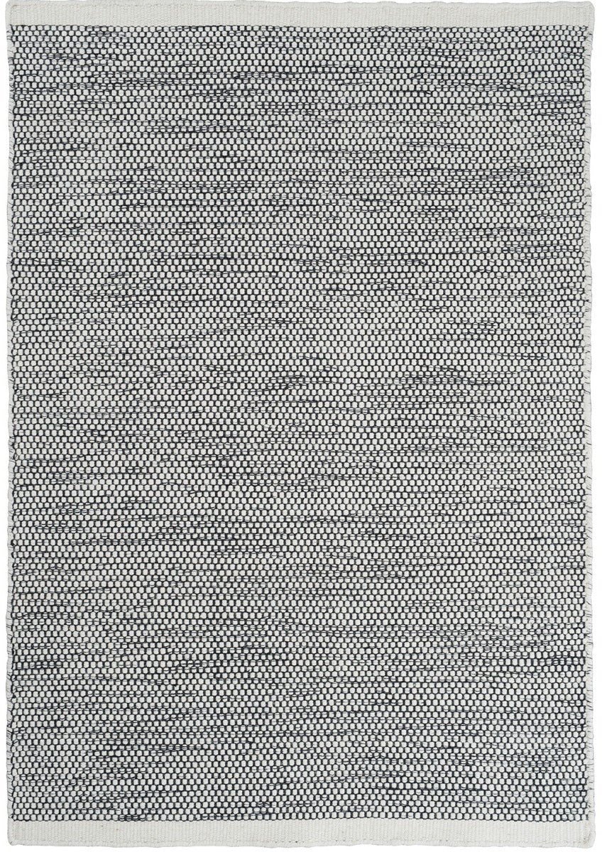 plain cream and black wool rug
