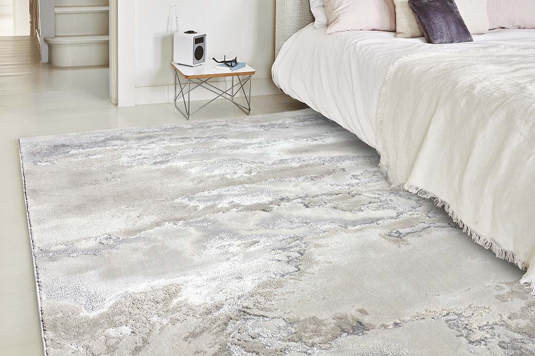 white abstract rug with a marble design