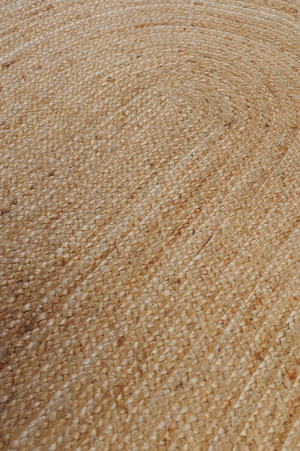 Brown oval jute rug