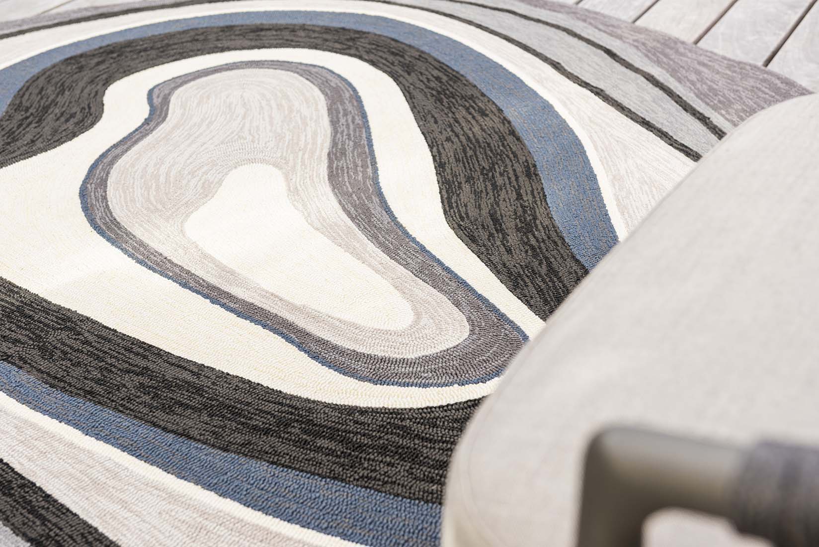 abstract shaped indoor/outdoor rug in grey
