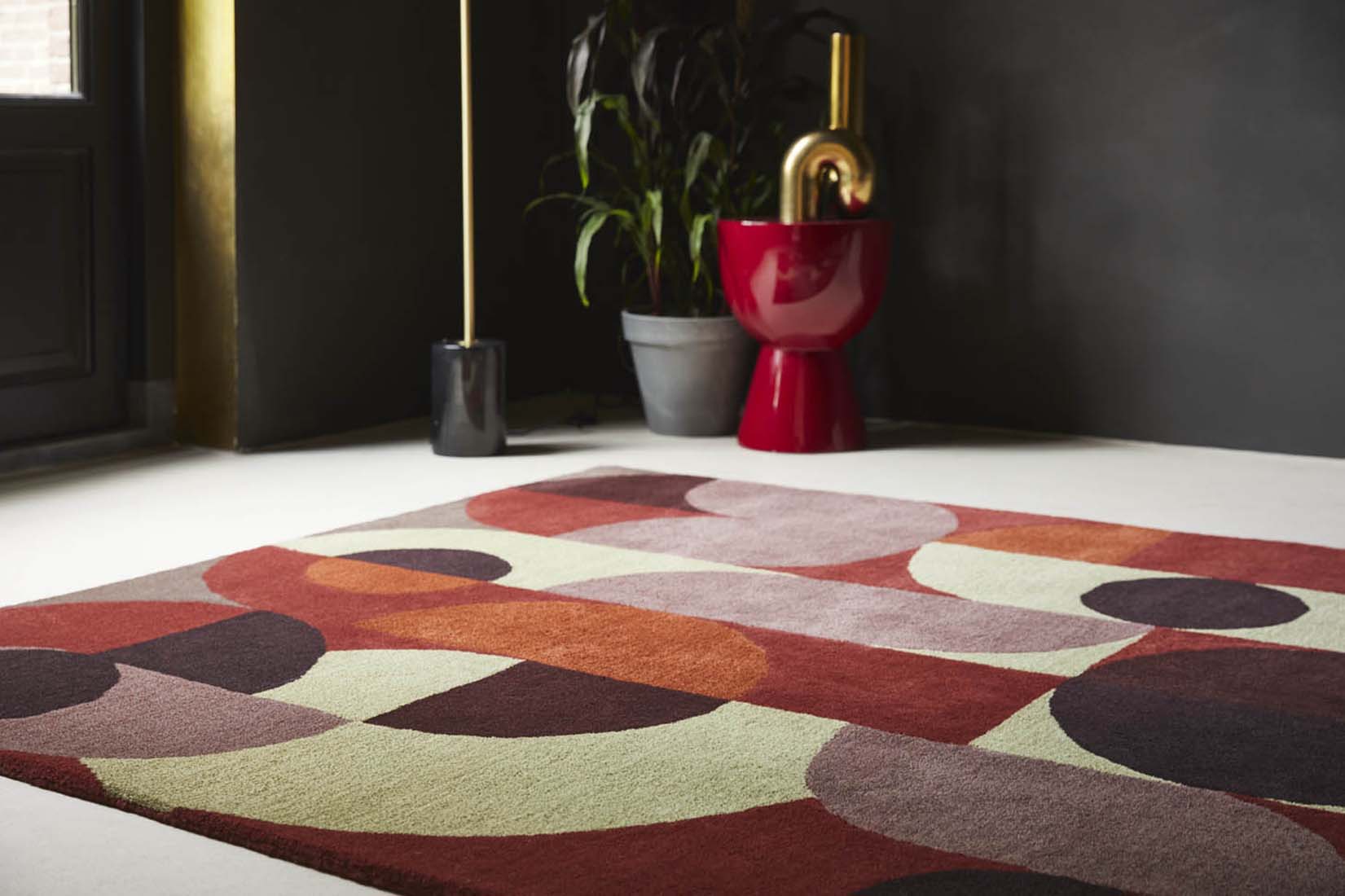 multicolour wool area rug with retro design 
