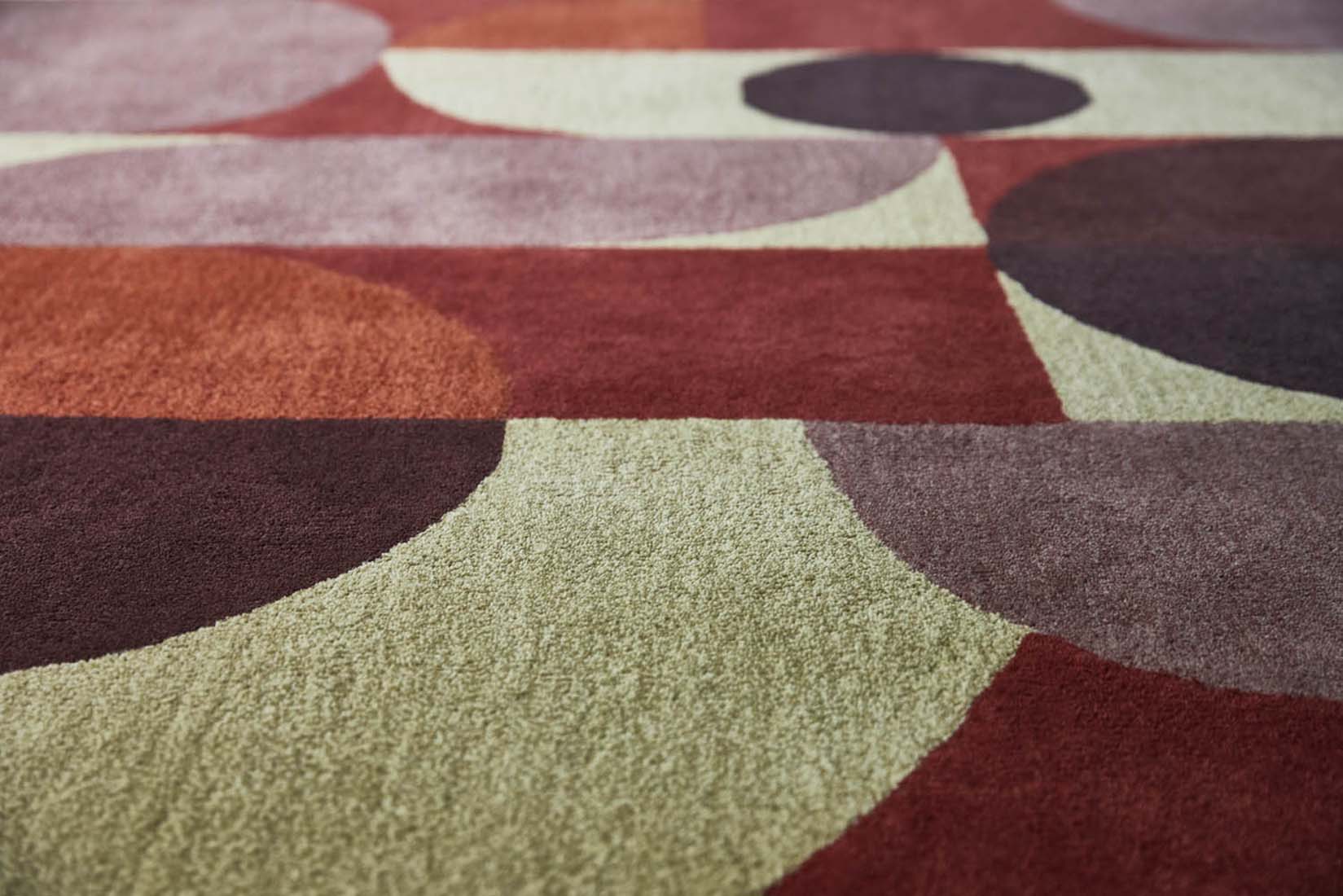 multicolour wool area rug with retro design 
