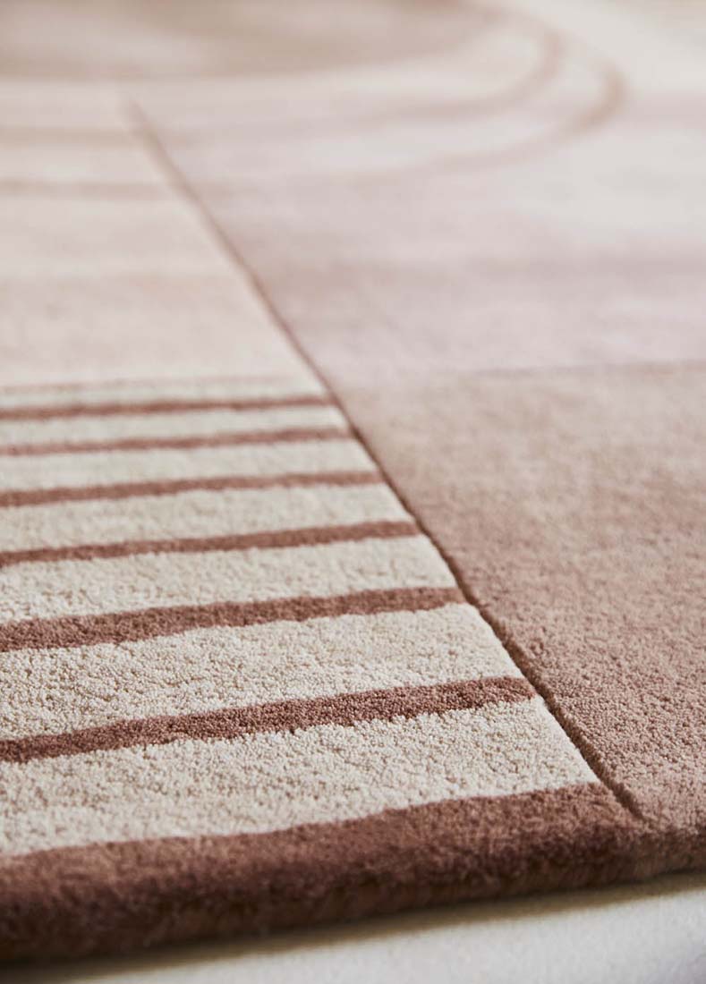 pink wool custom size rug with modern geometric design 
