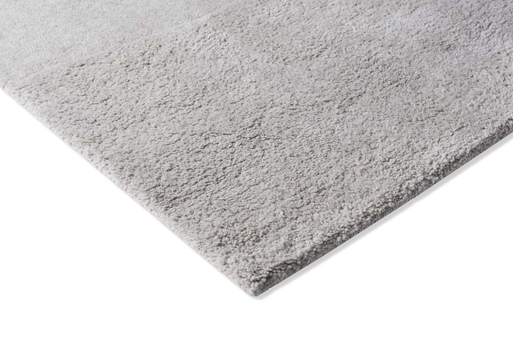grey wool rug with shapes

