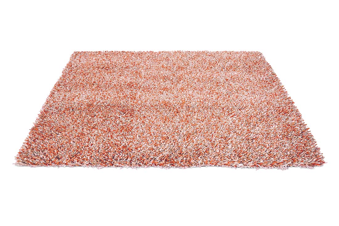 red and cream shagpile area rug 
