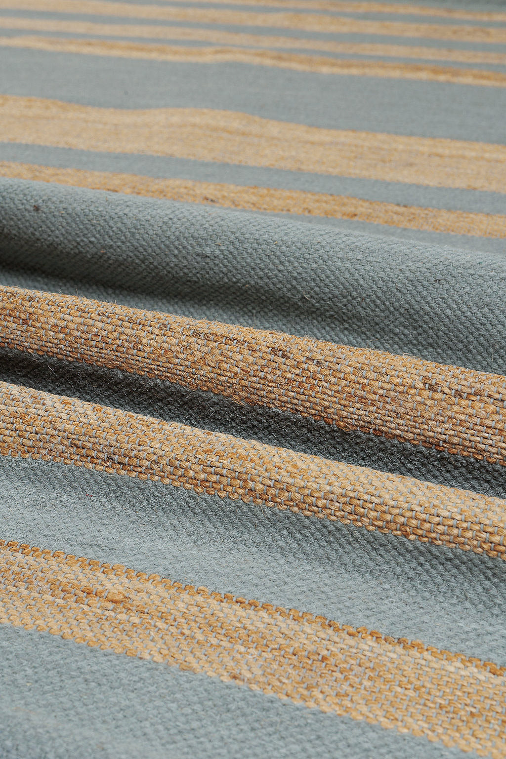 jute rug with duck egg blue stripes