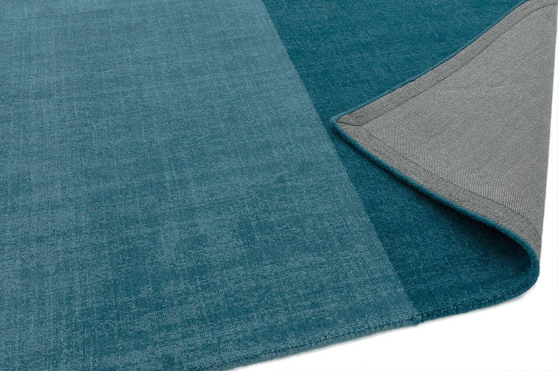 teal blue geometric rug