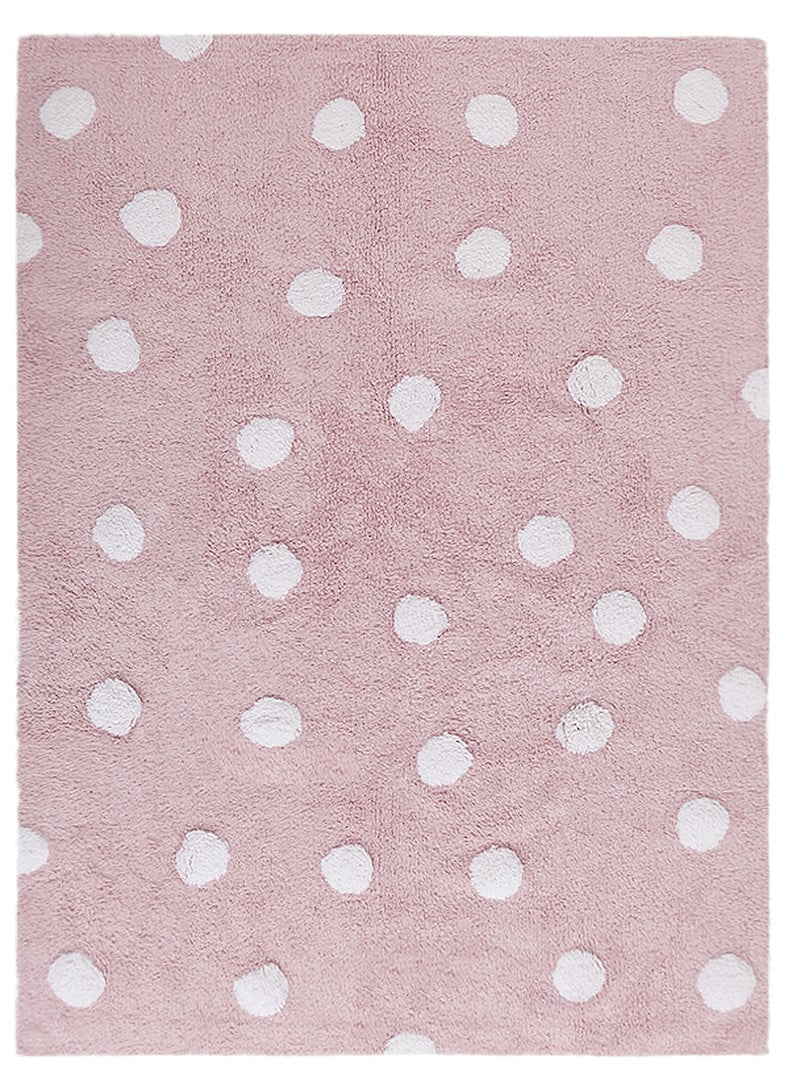 Rectangular pink cotton rug decorated with white polka dots