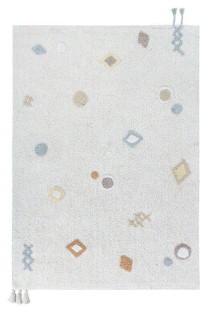 Cream lorena canals cotton rug decorated with shapes and tassels