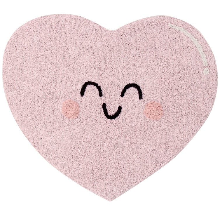 Pink, cotton tufted heart shaped rug
