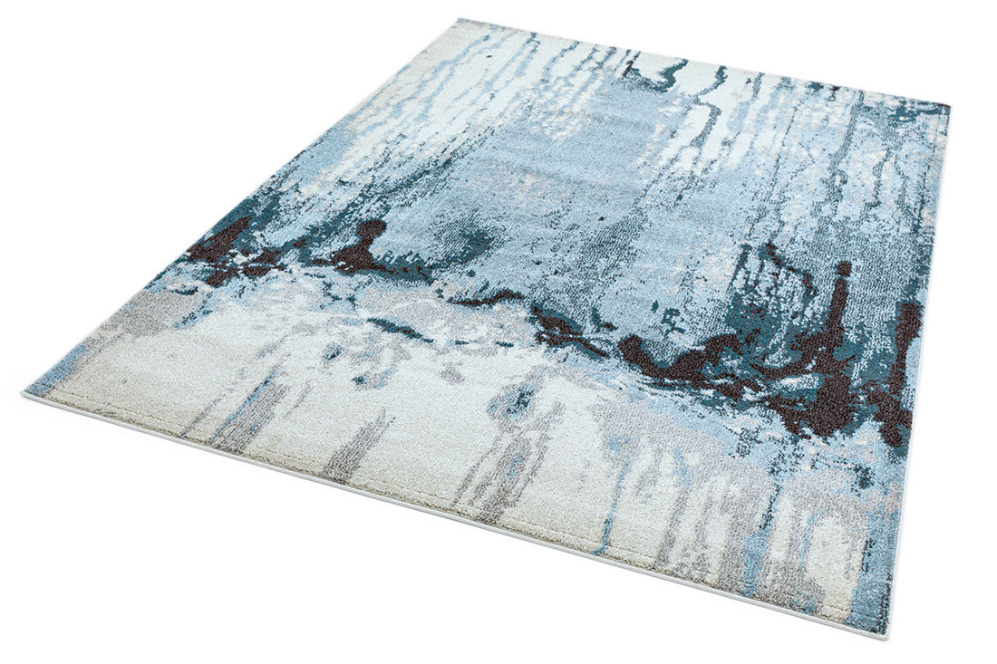area rug with an abstract paint design in white
