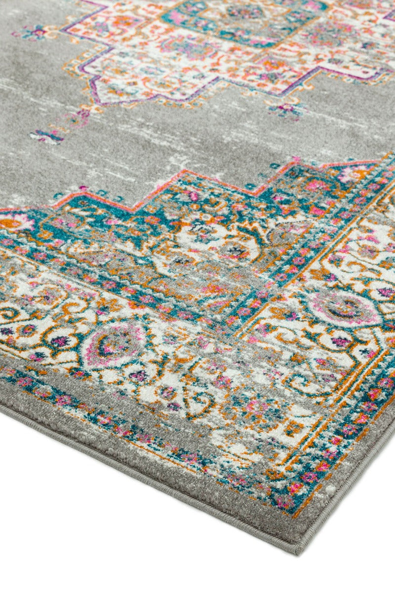 Polypropylene rug with traditional design in modern colours of grey, pink and orange