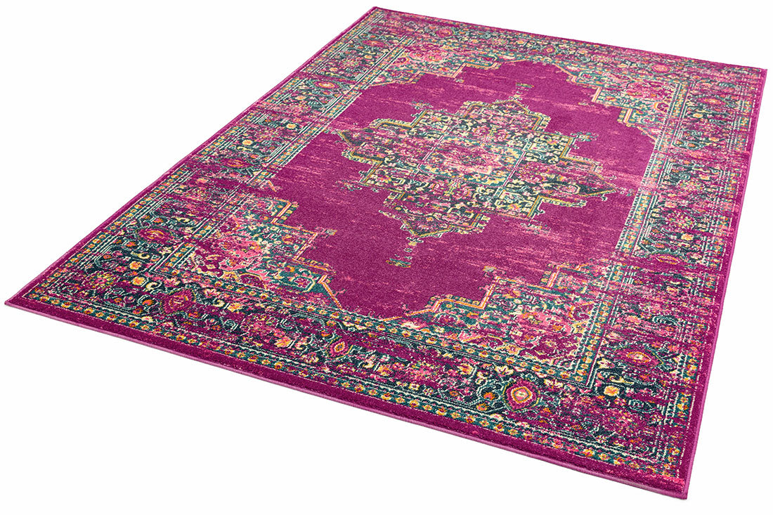 Polypropylene rug with traditional design in fuchsia pink