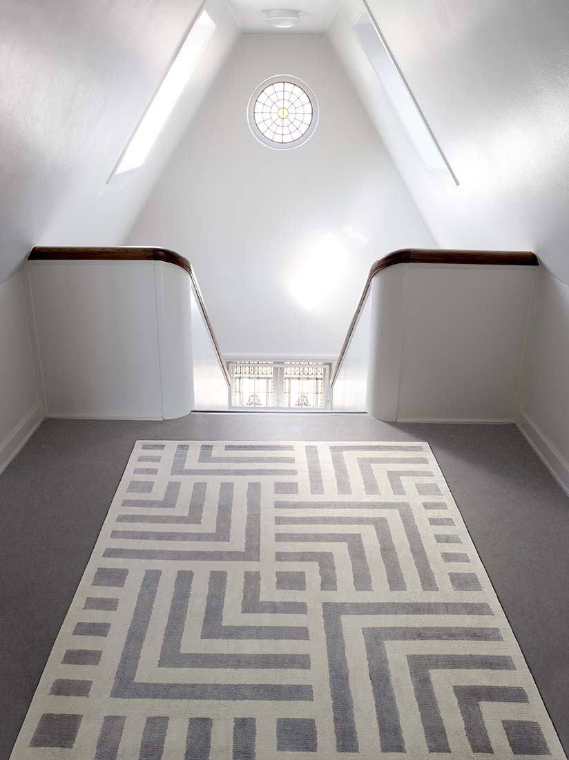 geometric area rug in grey and white