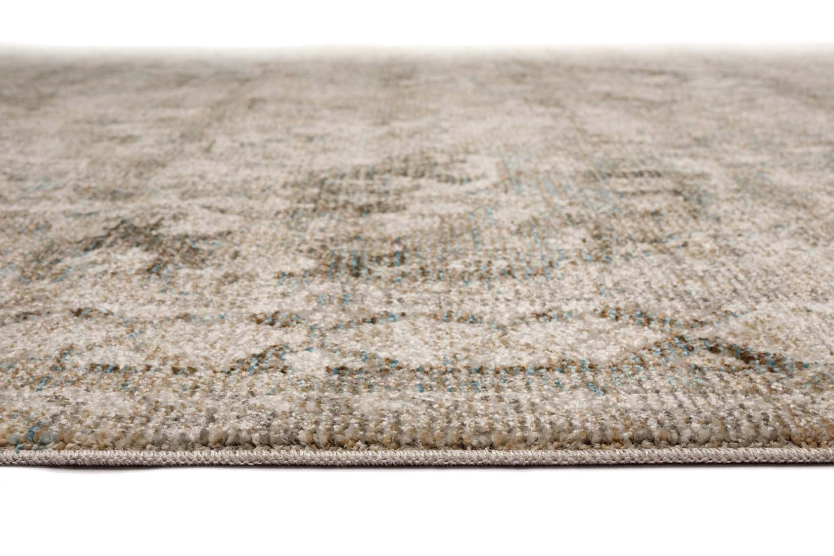 persian inspired area rug in grey, beige, and blue