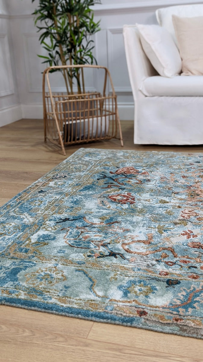 blue wool and viscose rug in a persian design 